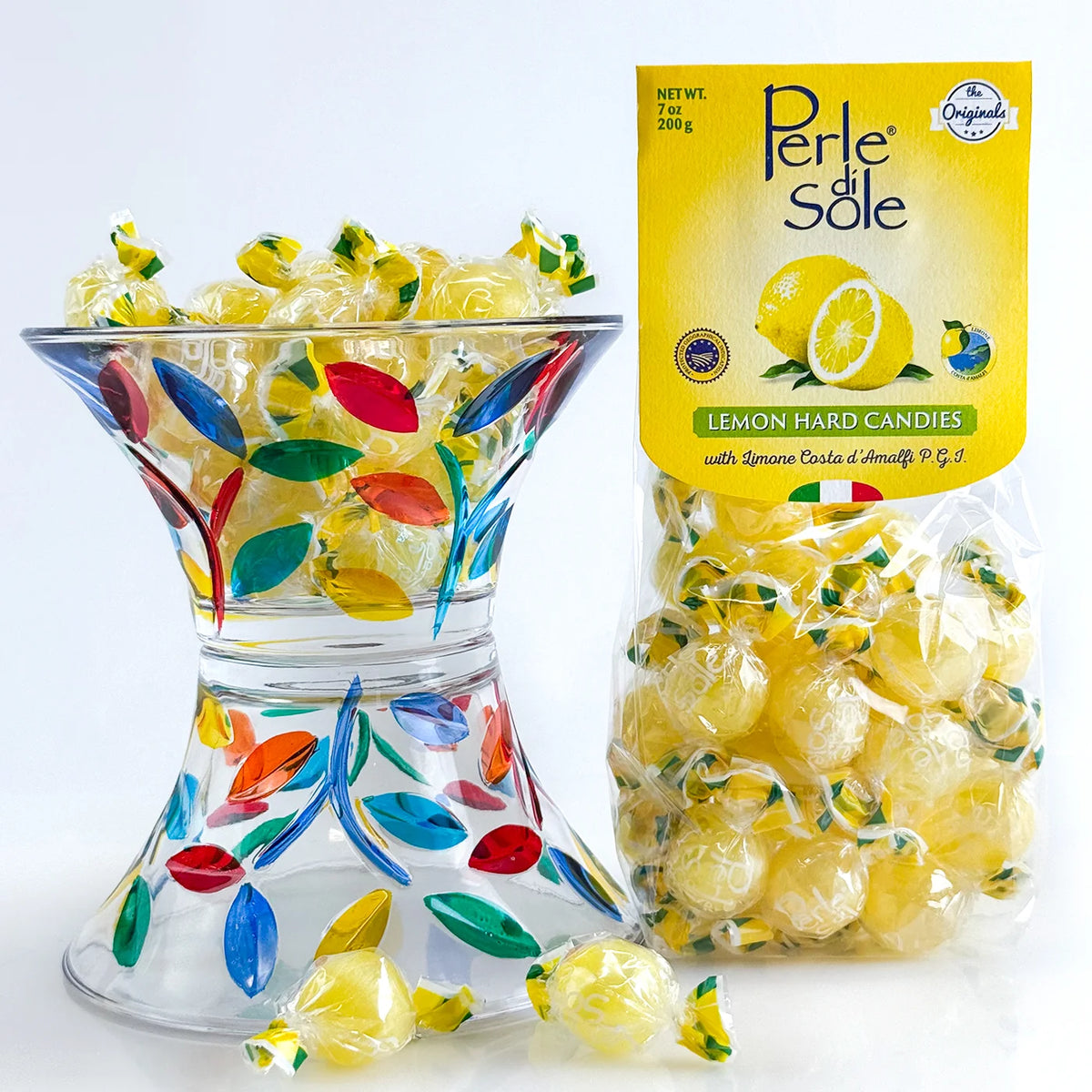 Lemon-shaped ceramic candy bowl filled with colorful Italian hard candies, part of My Italian Decor's bowl set.