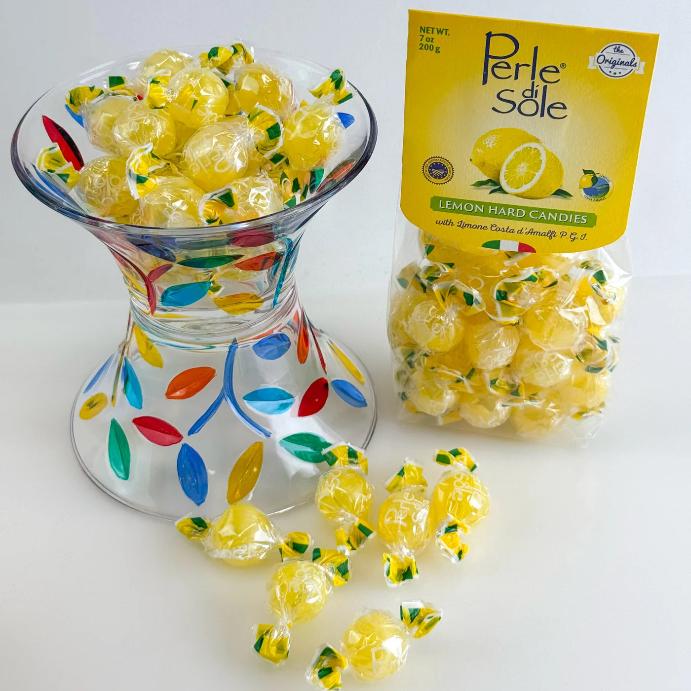 Lemon-colored ceramic candy bowl with Italian hard candies, decorative bowl by My Italian Decor, filled with colorful sweets.