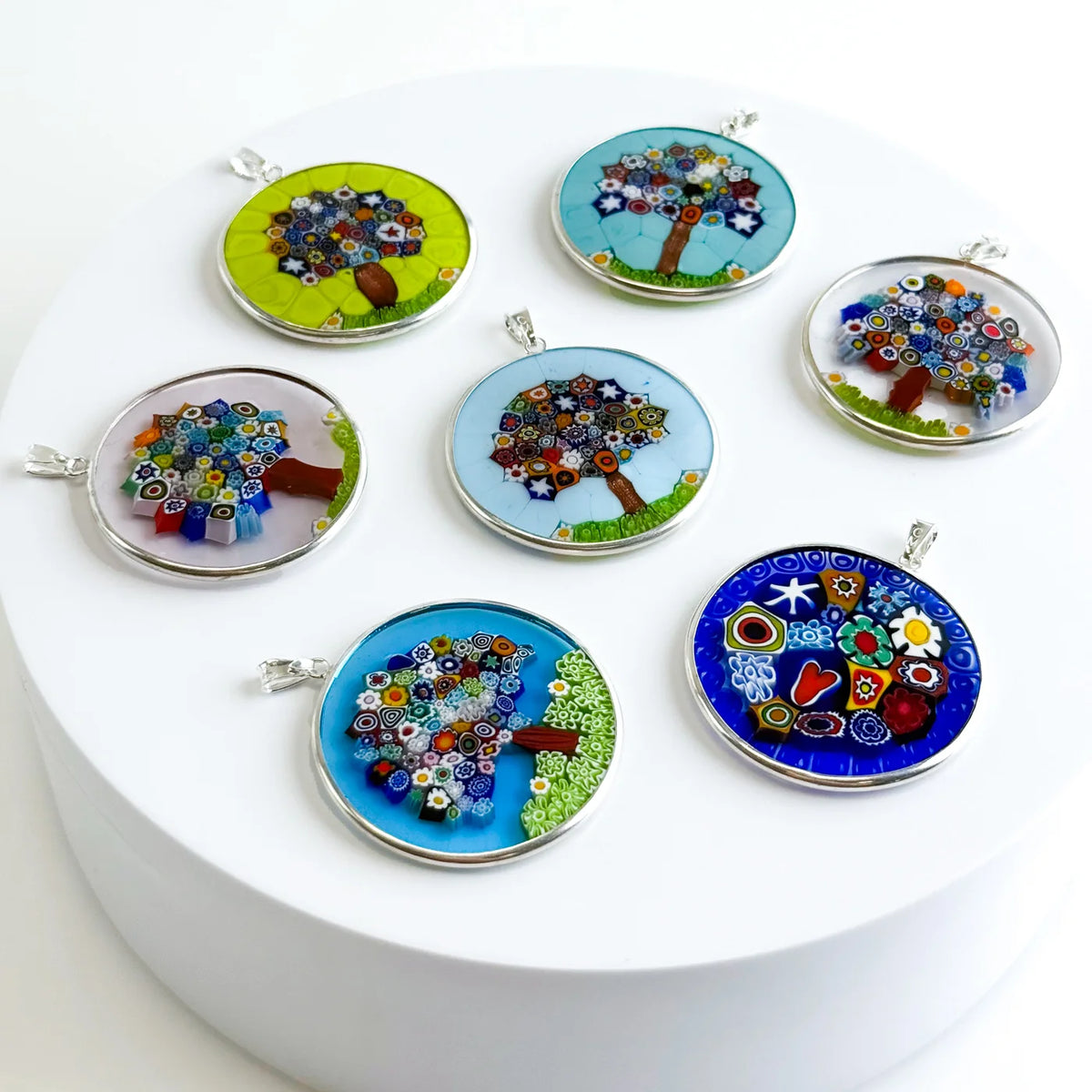 Sterling silver Millefiori Pendant Tree of Life necklace, 1.3-inch diameter, with intricate colorful glass design and detailed rim.