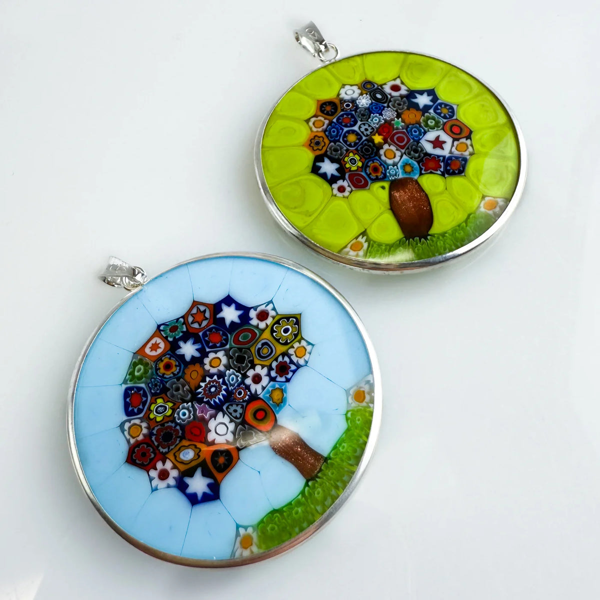 Sterling silver Millefiori Pendant Tree of Life necklace, 1.3-inch diameter, featuring colorful floral designs on a silver rim.