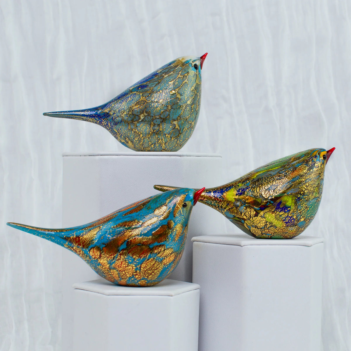 Hand-blown Murano glass Chirpie bird figurine named Luigi, crafted by MyItalianDecor, showcasing vibrant colors and detailed craftsmanship.