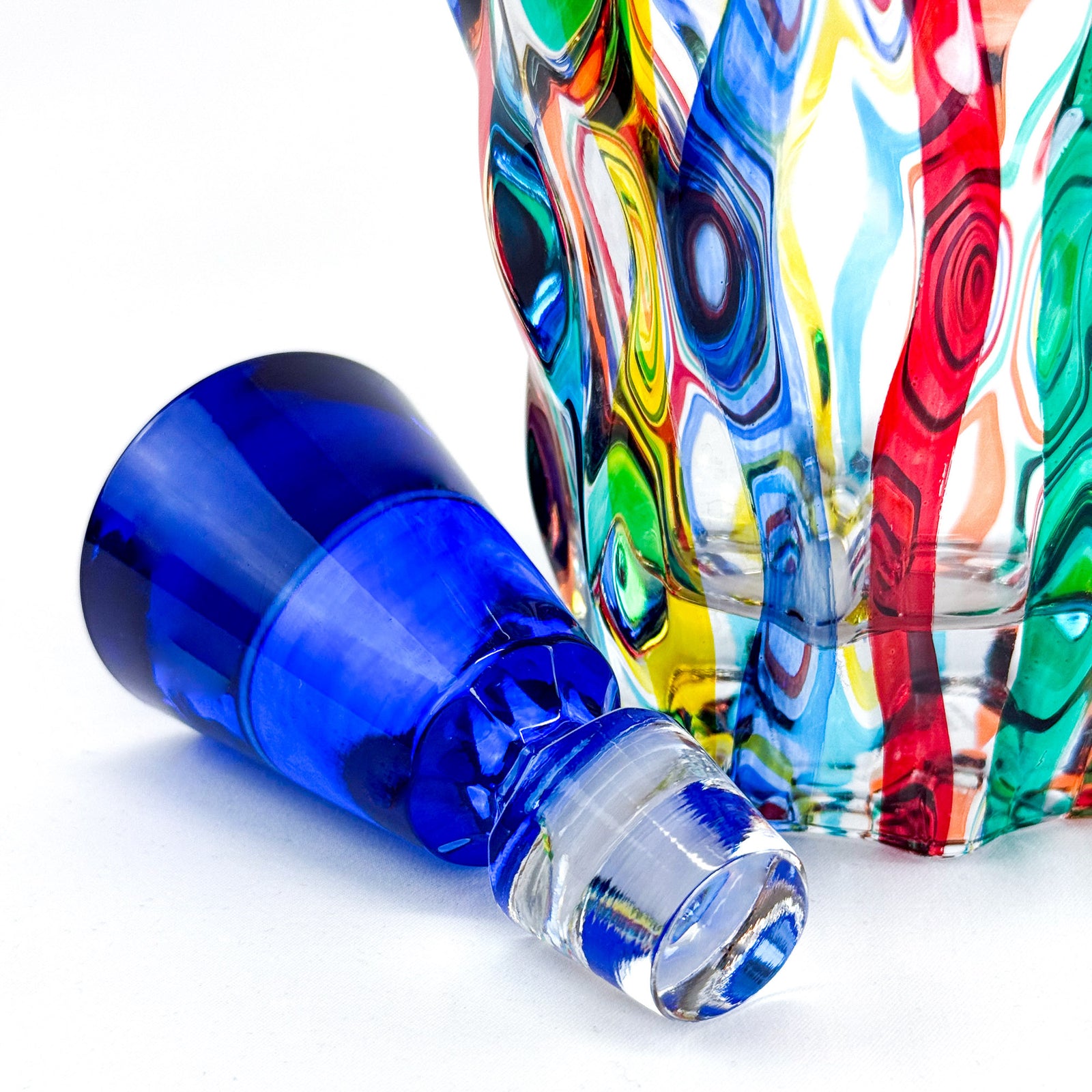 Hand-painted Italian crystal decanter from MyItalianDecor, featuring elegant lyrical design for storing and serving spirits.