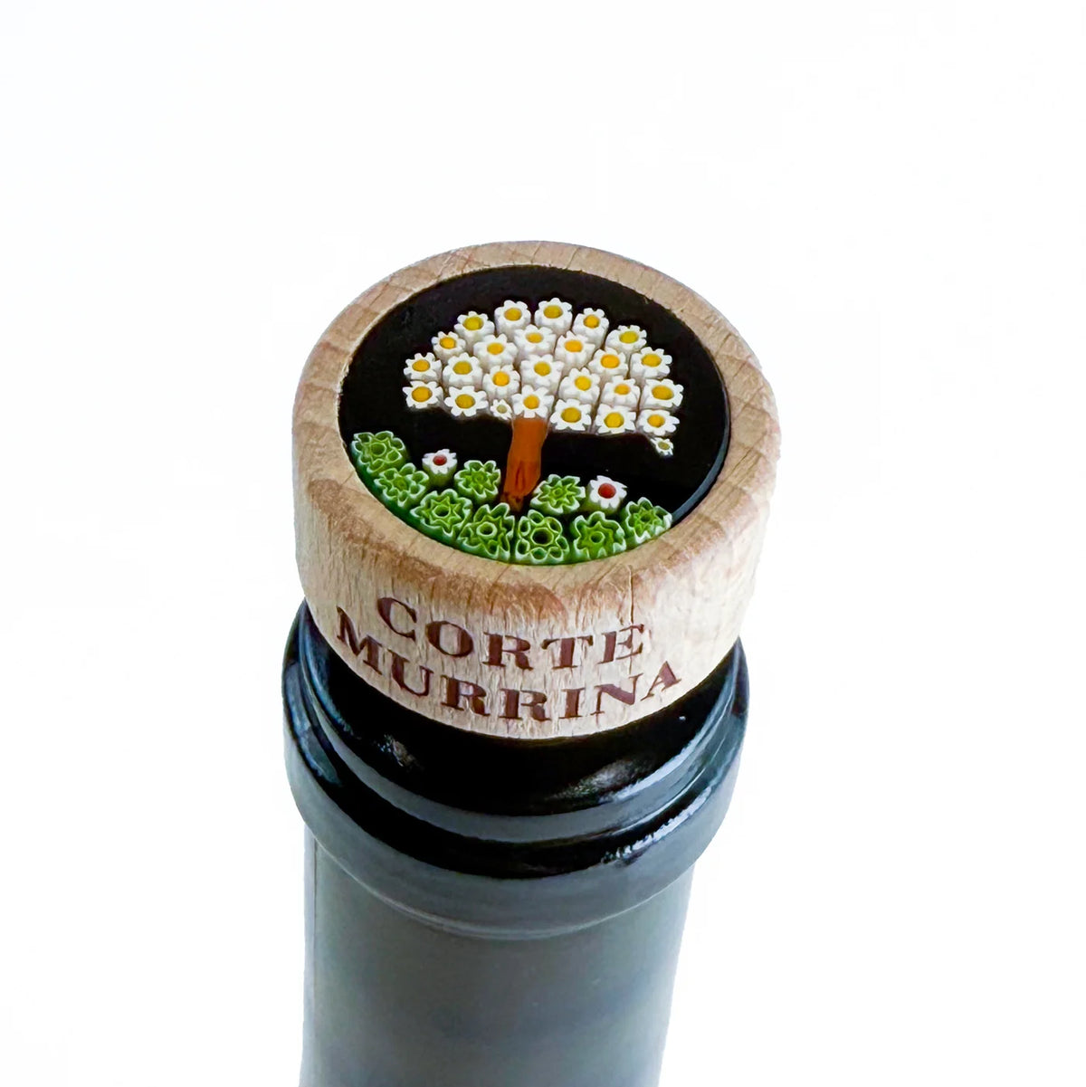 Murano glass wood wine stopper with tree design, made in Italy, for sealing bottles and preserving wine freshness.