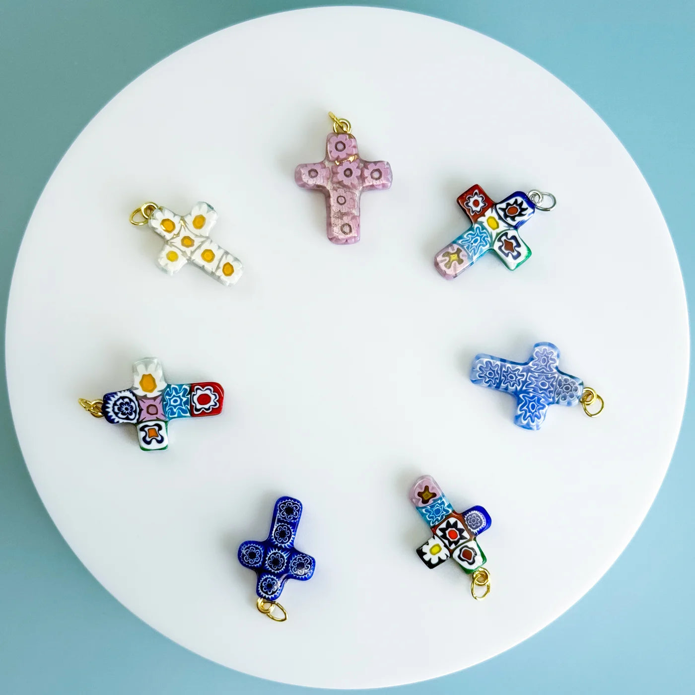 Colorful Millefiori cross pendant made in Italy featuring intricate glass designs, crafted by My Italian Decor.