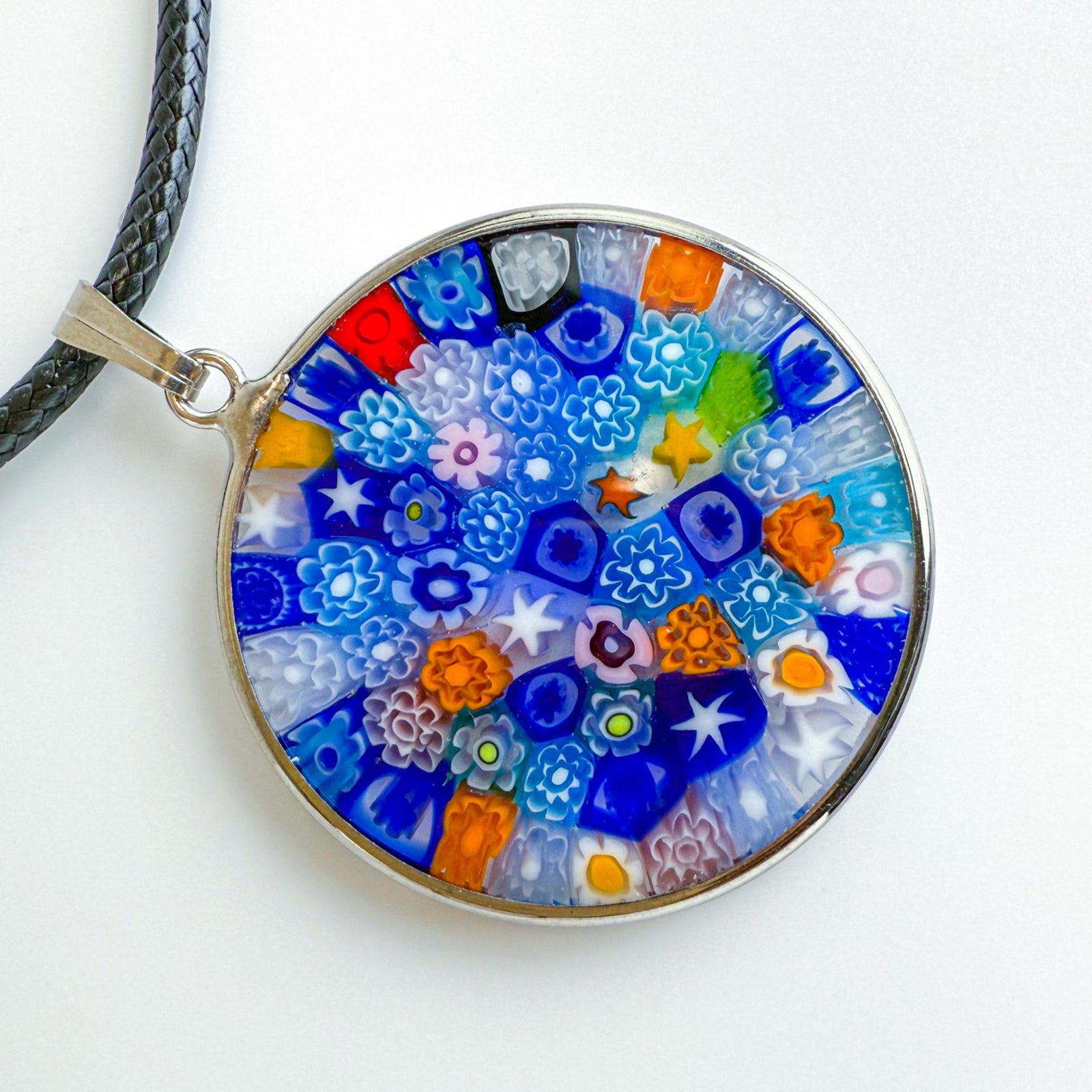 DZ Millefiori glass round disc pendant necklace with multi-color designs on silver chain, showcasing vibrant handcrafted jewelry.