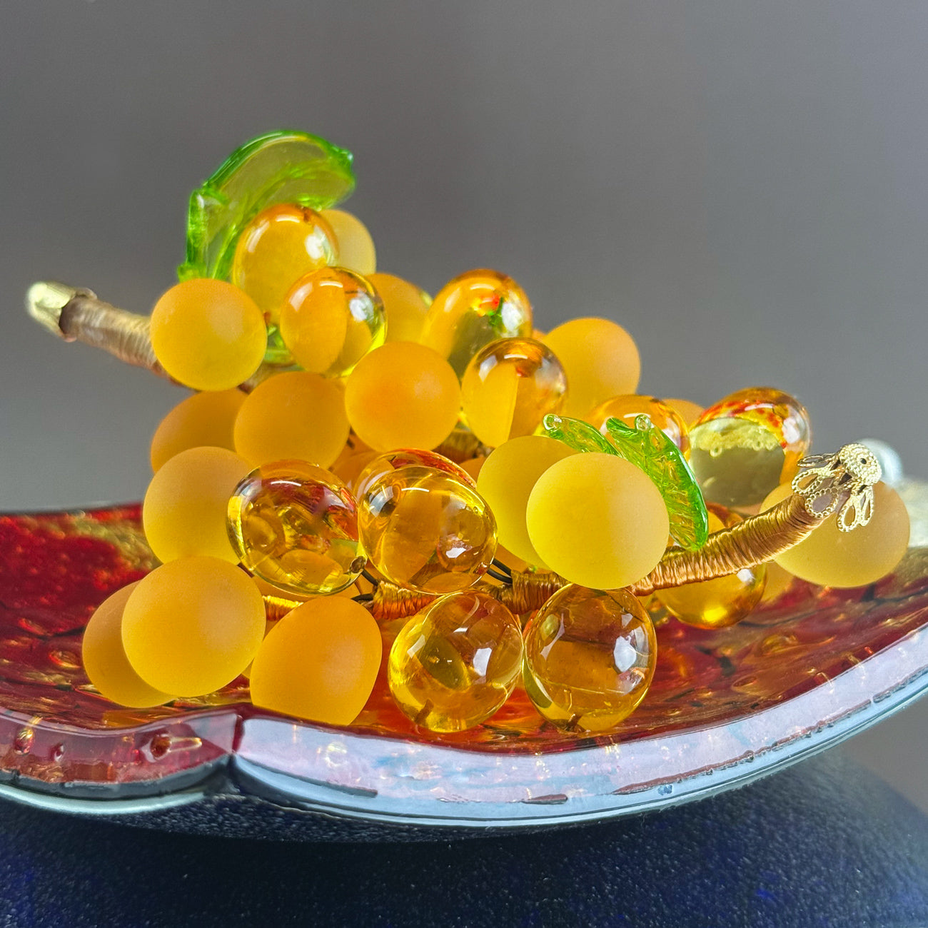 Large Murano glass grape cluster by MyItalianDecor, realistic artificial flora showcasing colorful, handcrafted Italian glass grapes.