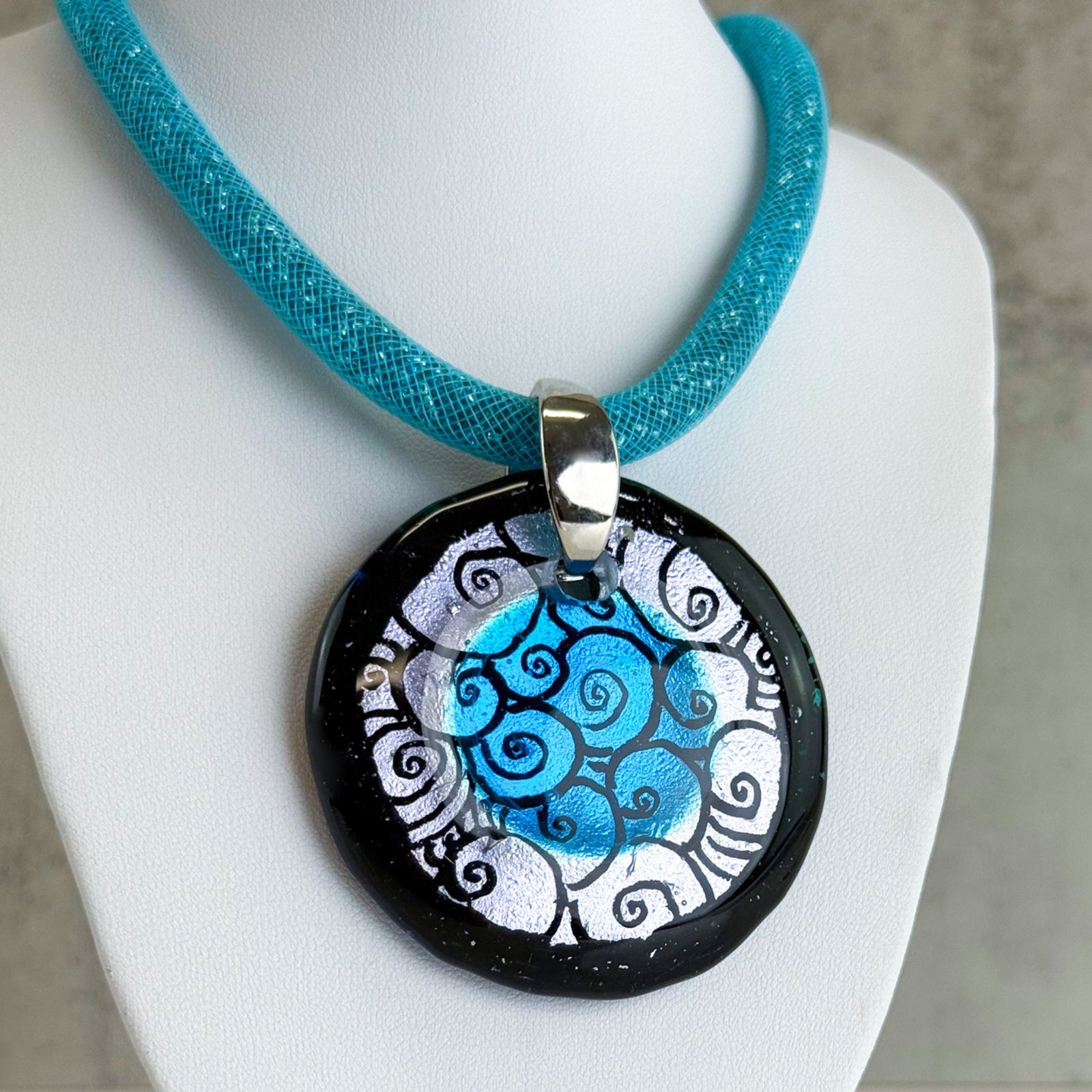 Large Italian Murano glass round pendant necklace with chunky design, featuring vibrant colors and artisanal craftsmanship.