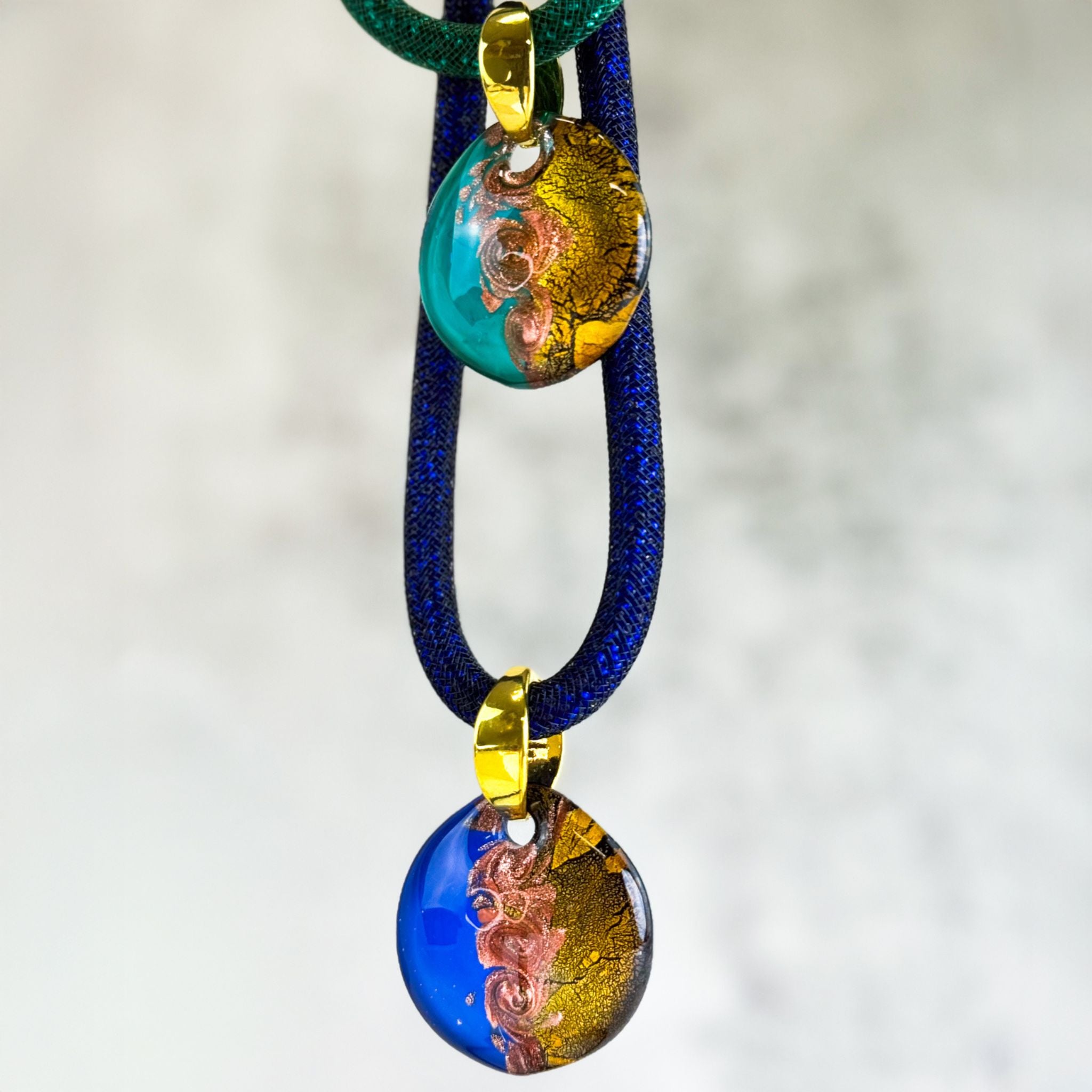 Large round Murano glass pendant necklace with chunky design, featuring vibrant Italian Murano glass charms and intricate craftsmanship.