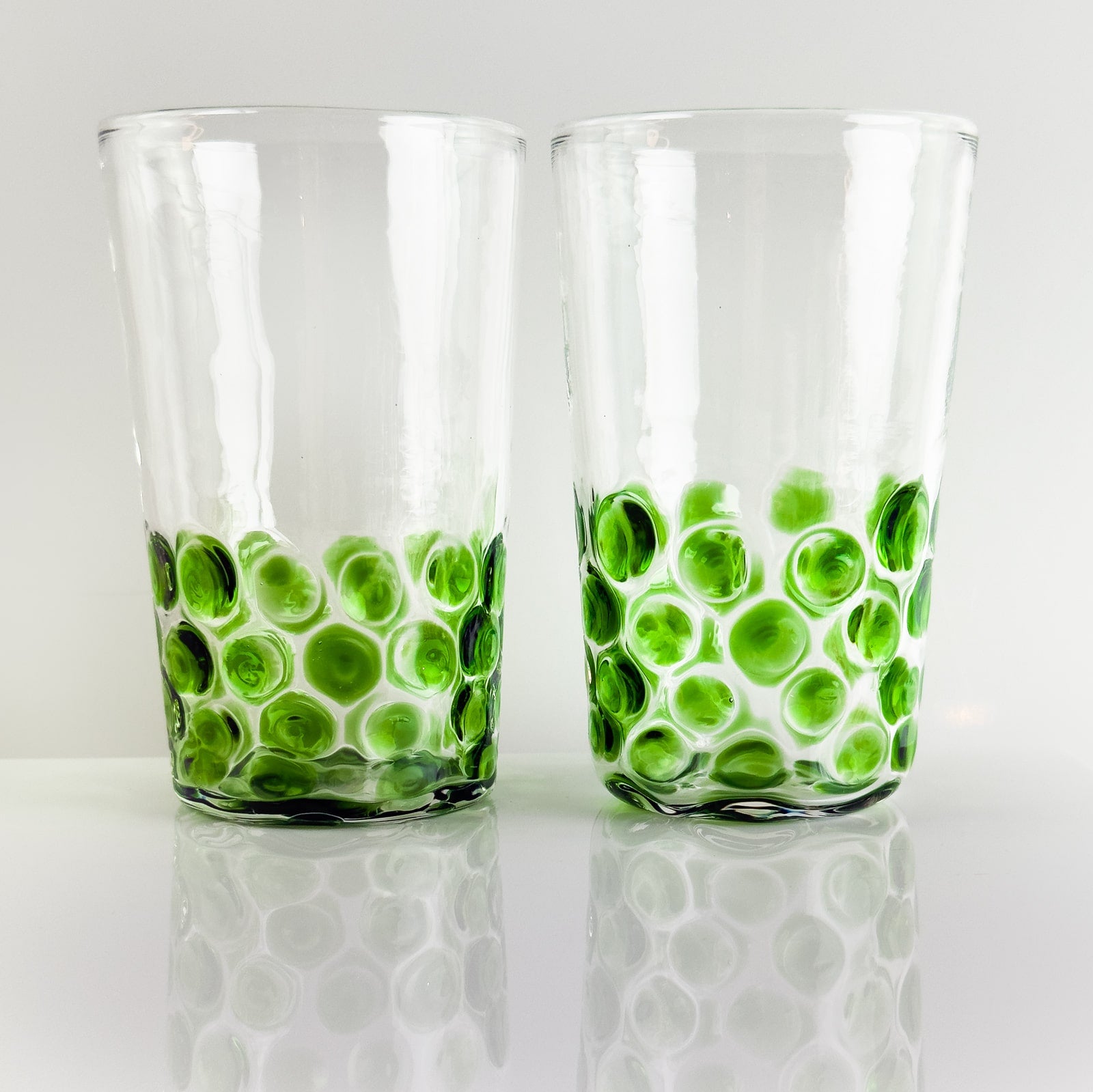 Set of 2 Italian wine glass tumblers with dotted design by My Italian Decor, made in Italy, featuring clear glass and elegant shape.