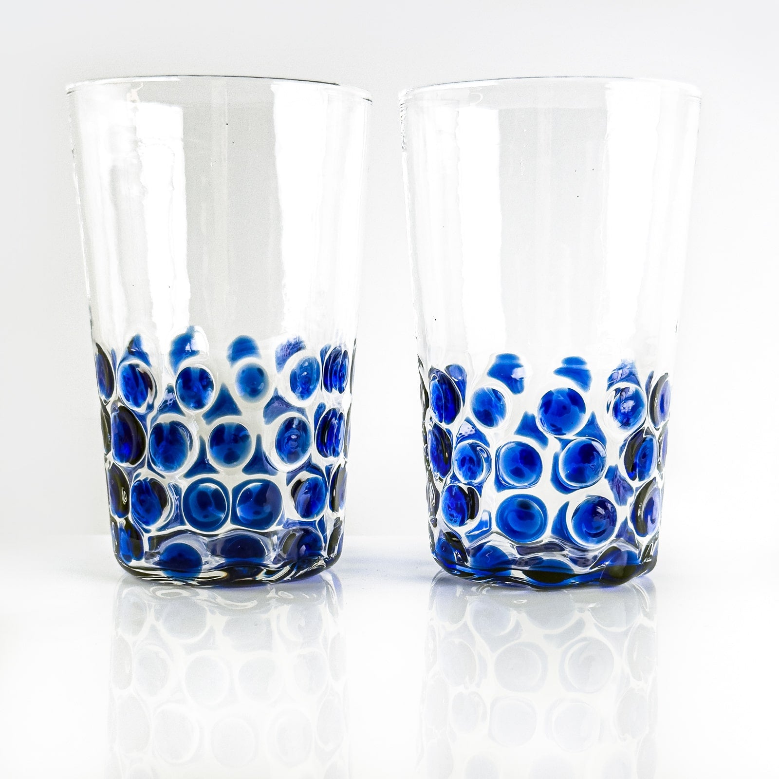Set of 2 Italian wine glass tumblers with dotted design by My Italian Decor, made in Italy, featuring clear glass and elegant shape.