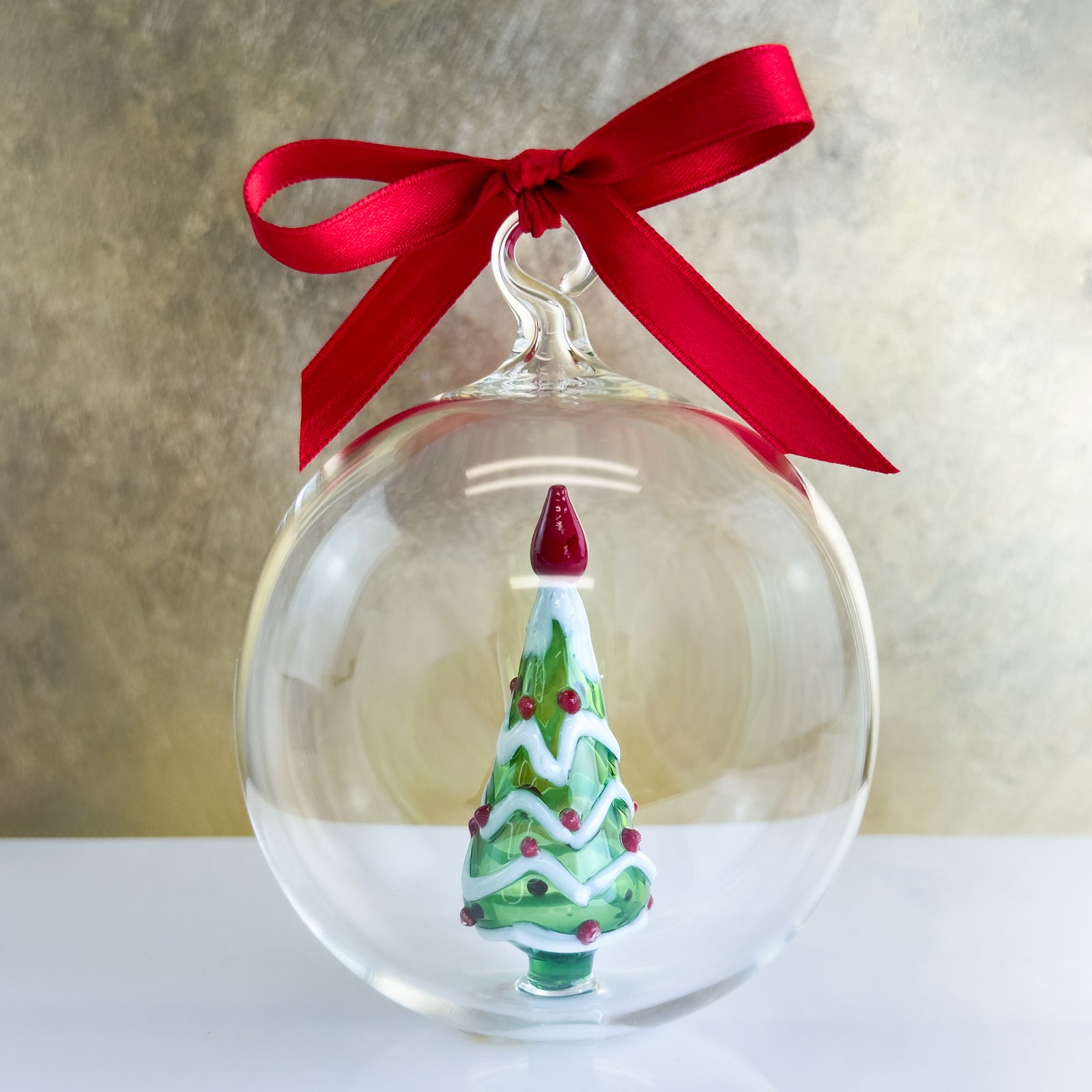 Clear blown glass Christmas tree ornament with holiday design by My Italian Decor, perfect for festive holiday decorating.