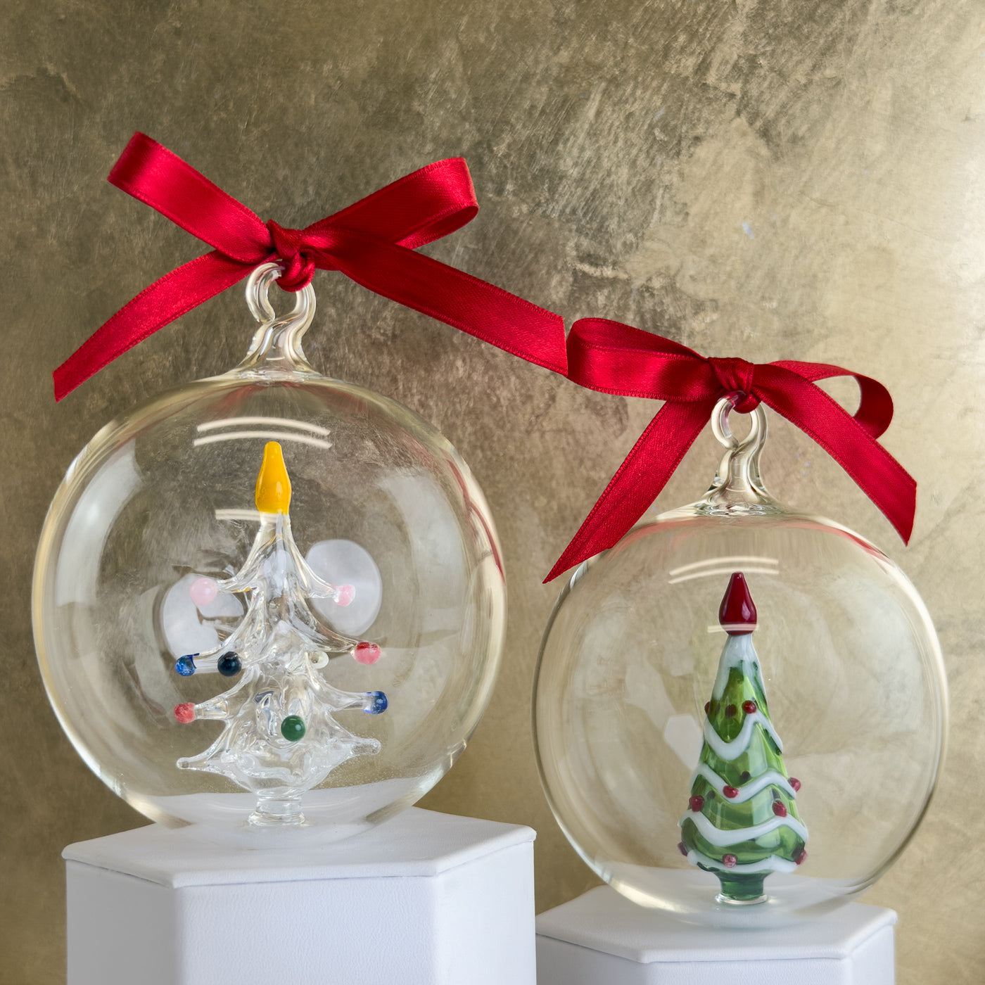 Clear glass Christmas ornament with a green holiday tree design, from My Italian Decor holiday ornaments collection.