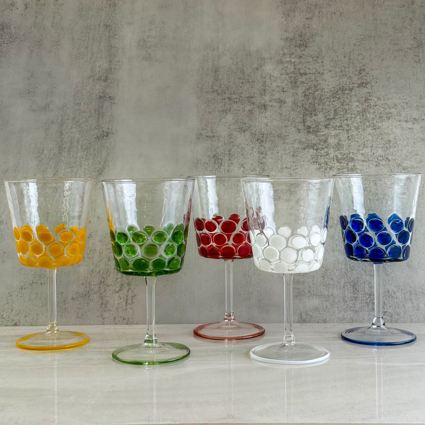 Set of 2 Dots wine glasses by My Italian Decor, featuring clear glass with dotted design, made in Italy.