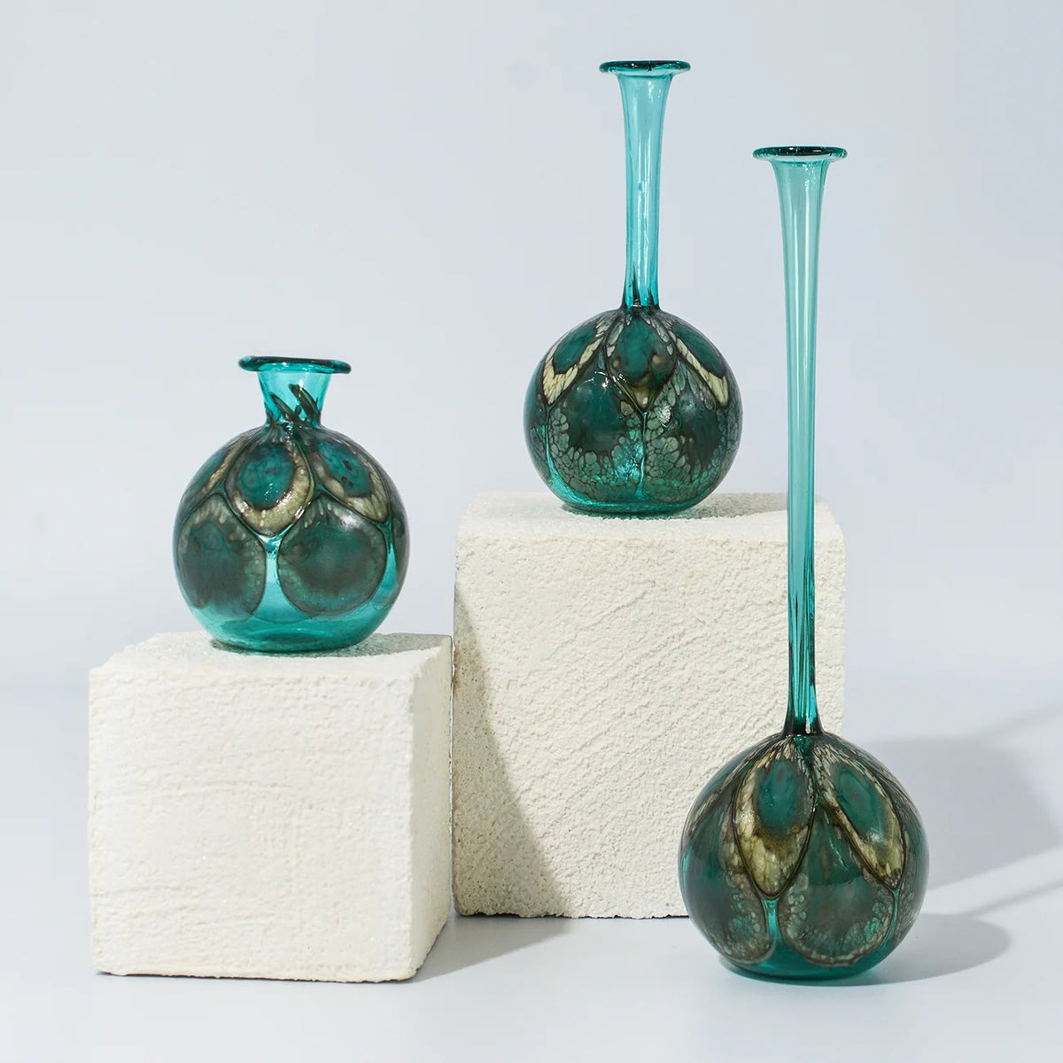 Murano glass peacock-shaped decorative bottle vase from My Italian Decor, featuring vibrant colors and intricate glasswork.