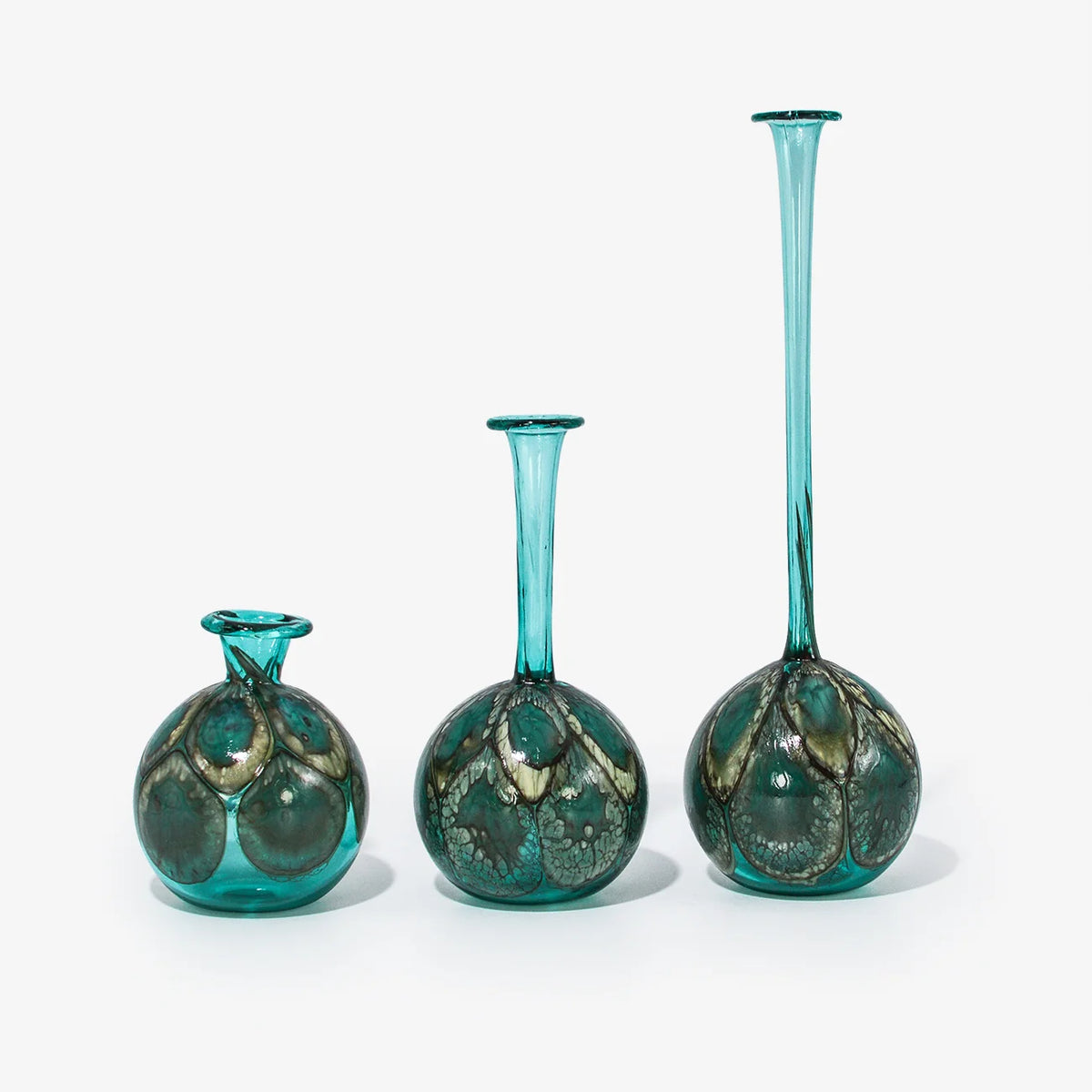 Elegant Murano glass peacock-shaped decorative bottle with vibrant colors, used as a bud vase or display piece.