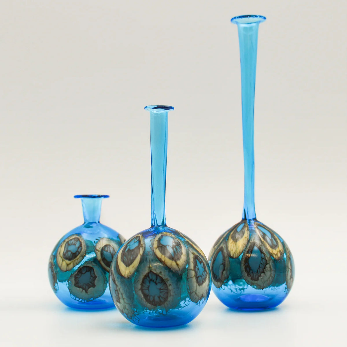 Murano glass peacock-shaped decorative bottle vase, elegant Italian design, with intricate details and vibrant colors.
