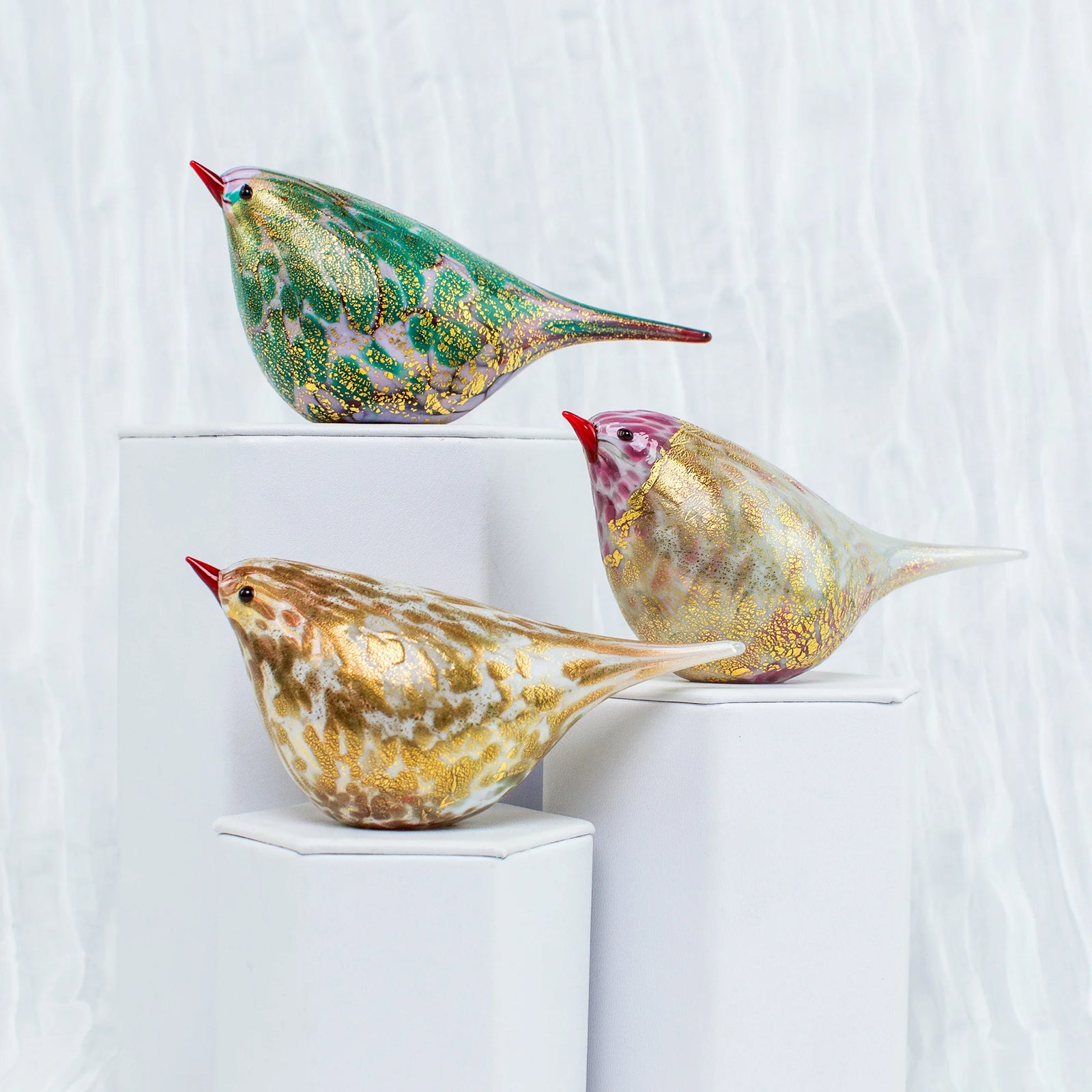 Pink and gold Murano glass Chirpie bird figurine by Rosanna, showcasing intricate craftsmanship and vibrant colors.