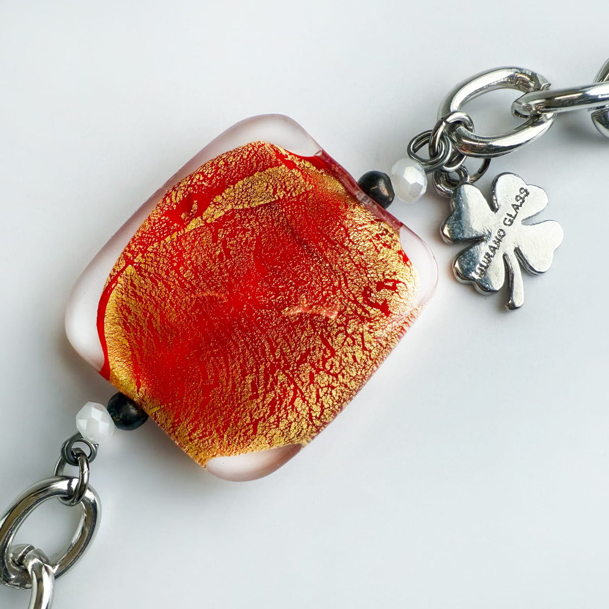 Silver Murano glass square bead bracelet with charm, handcrafted jewelry set made in Italy with elegant Italian design.