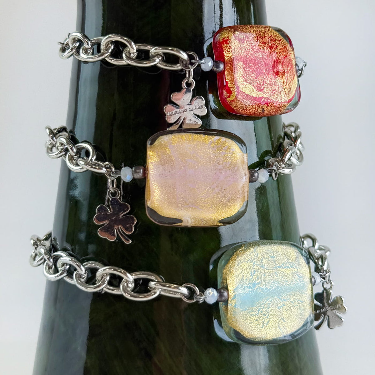 Silver Murano glass square bead bracelet with charm, handcrafted Italian jewelry set featuring elegant design and vibrant glass beads.