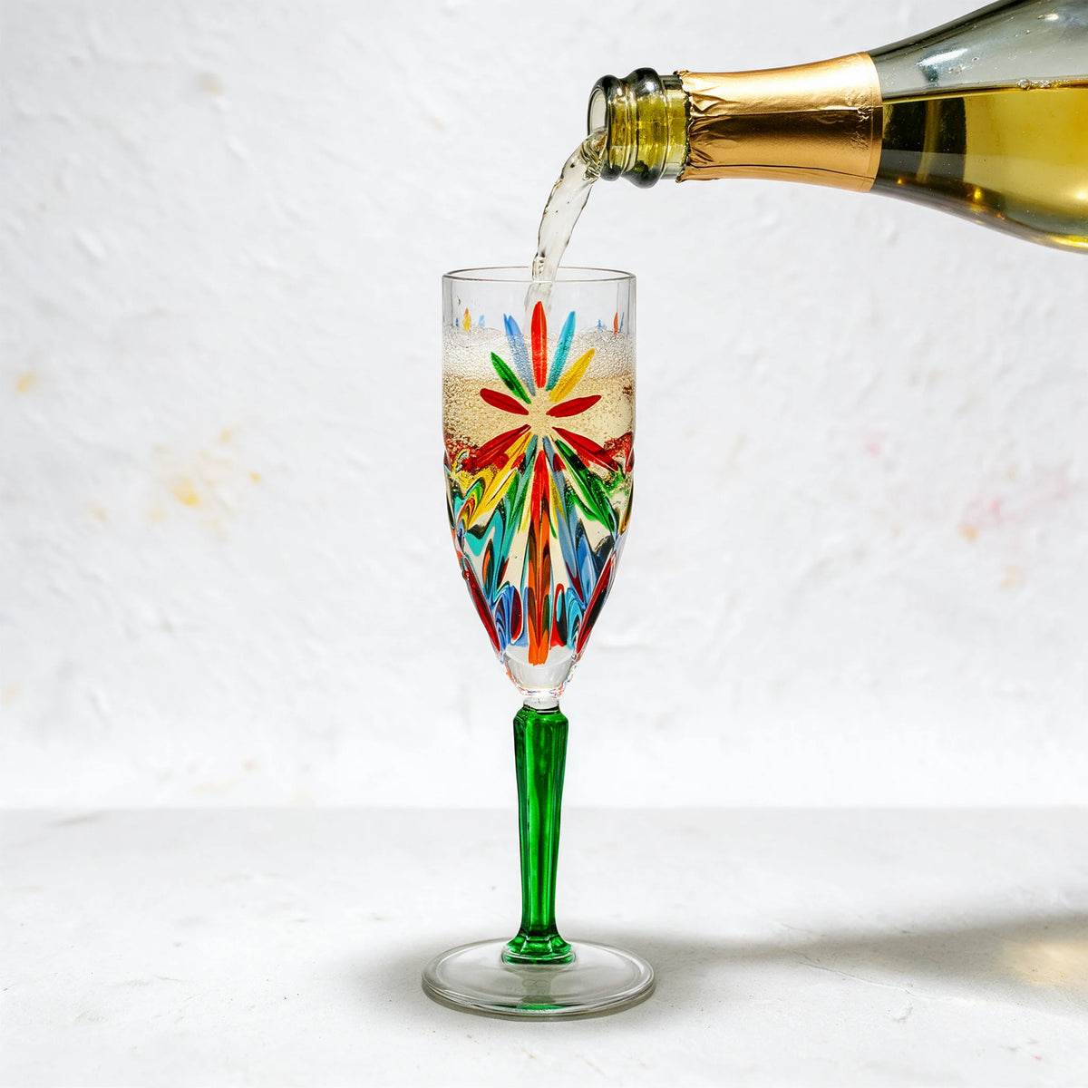 Set of two DZ Starburst Champagne Flutes with a sleek, modern design, made in Italy, perfect for celebratory toasts.
