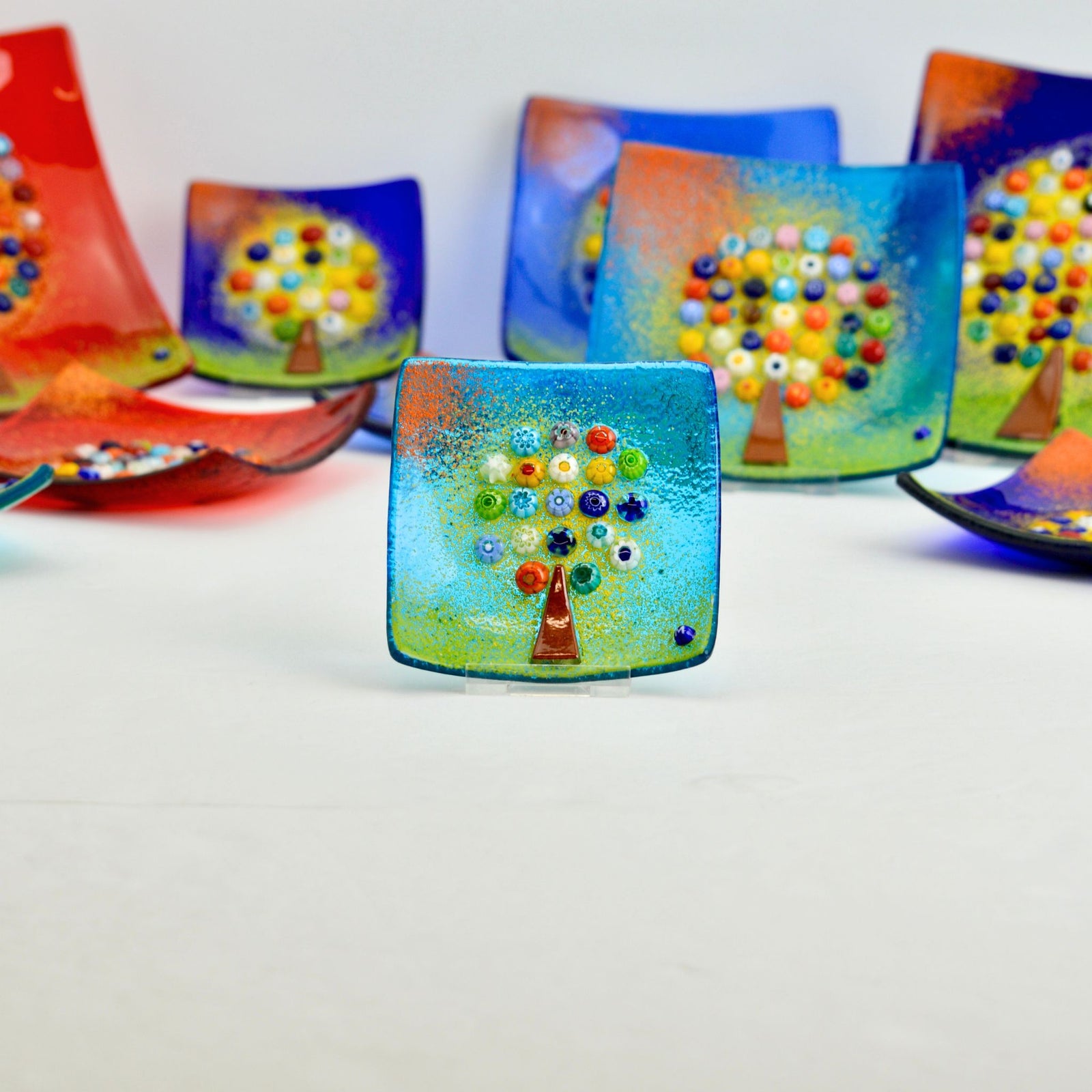 Decorative Murano Glass Tree of Life Dish in small, medium, or large size, showcasing vibrant colors and intricate design.