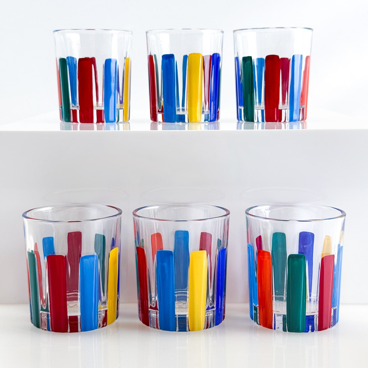 Set of 6 DZ crystal shot glasses with multicolor opaque design, showcasing sleek, durable shot glasses with vibrant color accents.