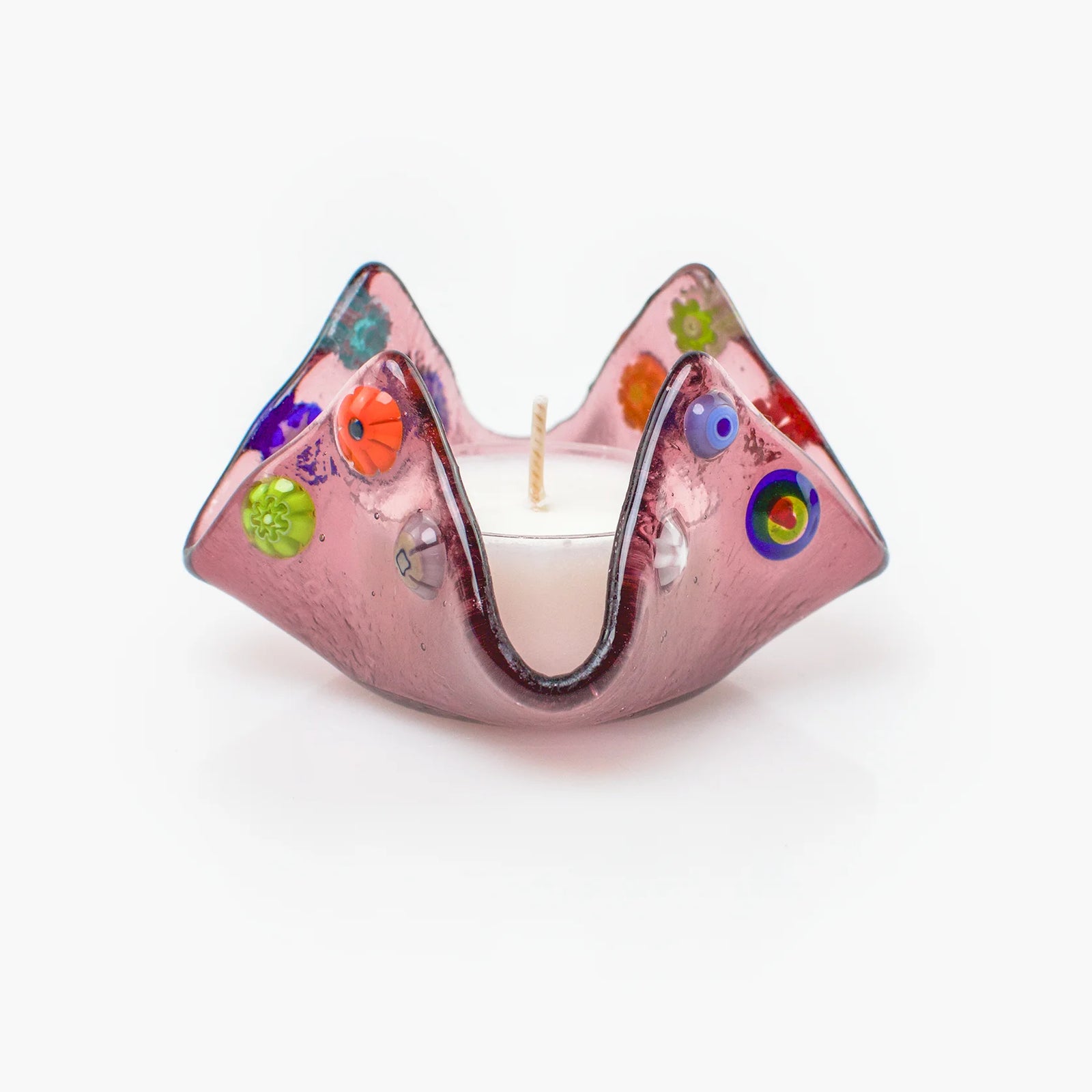 Colorful Murano glass Millefiori candle votive holder on a decorative tray, handcrafted in Italy with intricate glasswork.