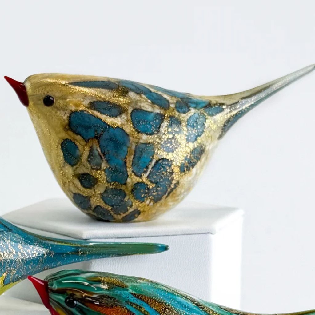 Murano glass teal Chirpie bird figurine by My Italian Decor, handcrafted in Italy, showcasing intricate design and vibrant color.