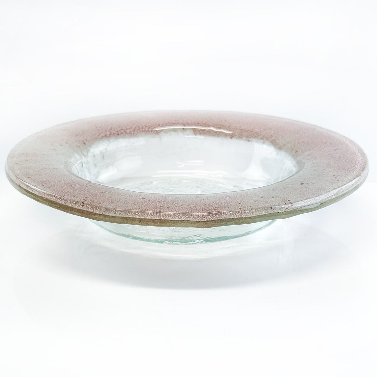 Glass bowl with a speckled rim on a white background
