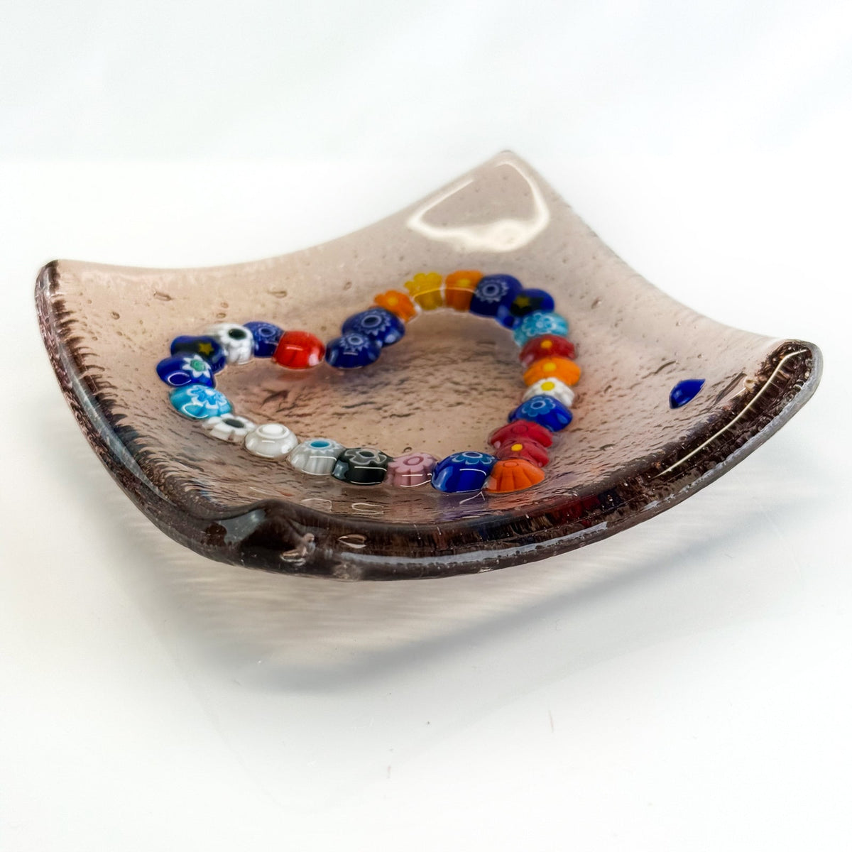 Decorative Murano glass heart-shaped dish with Millefiori pattern, 4-inch catch-all tray for jewelry or small items.
