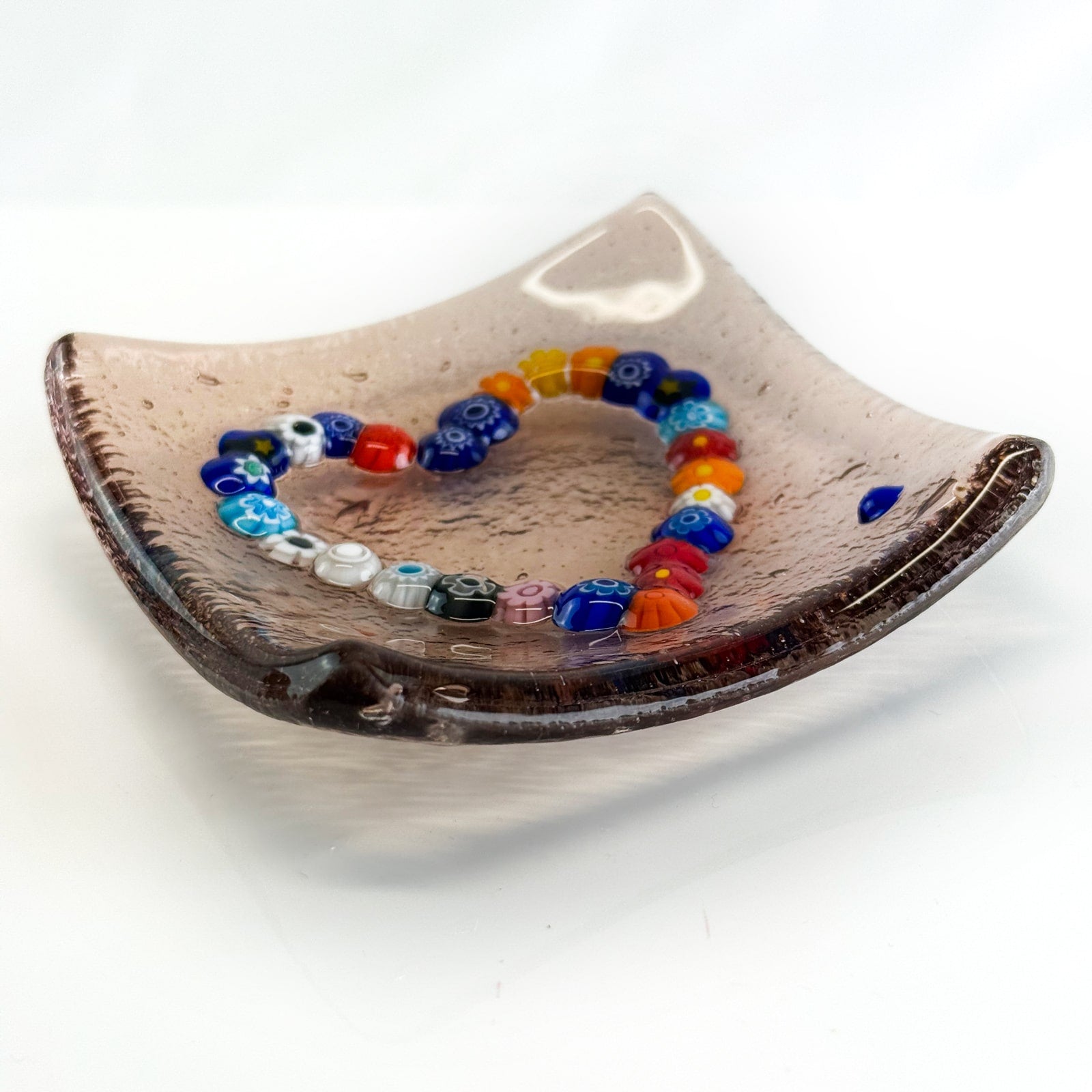 Decorative Murano glass heart dish with Millefiori pattern, 4-inch catch-all tray for jewelry or small items.