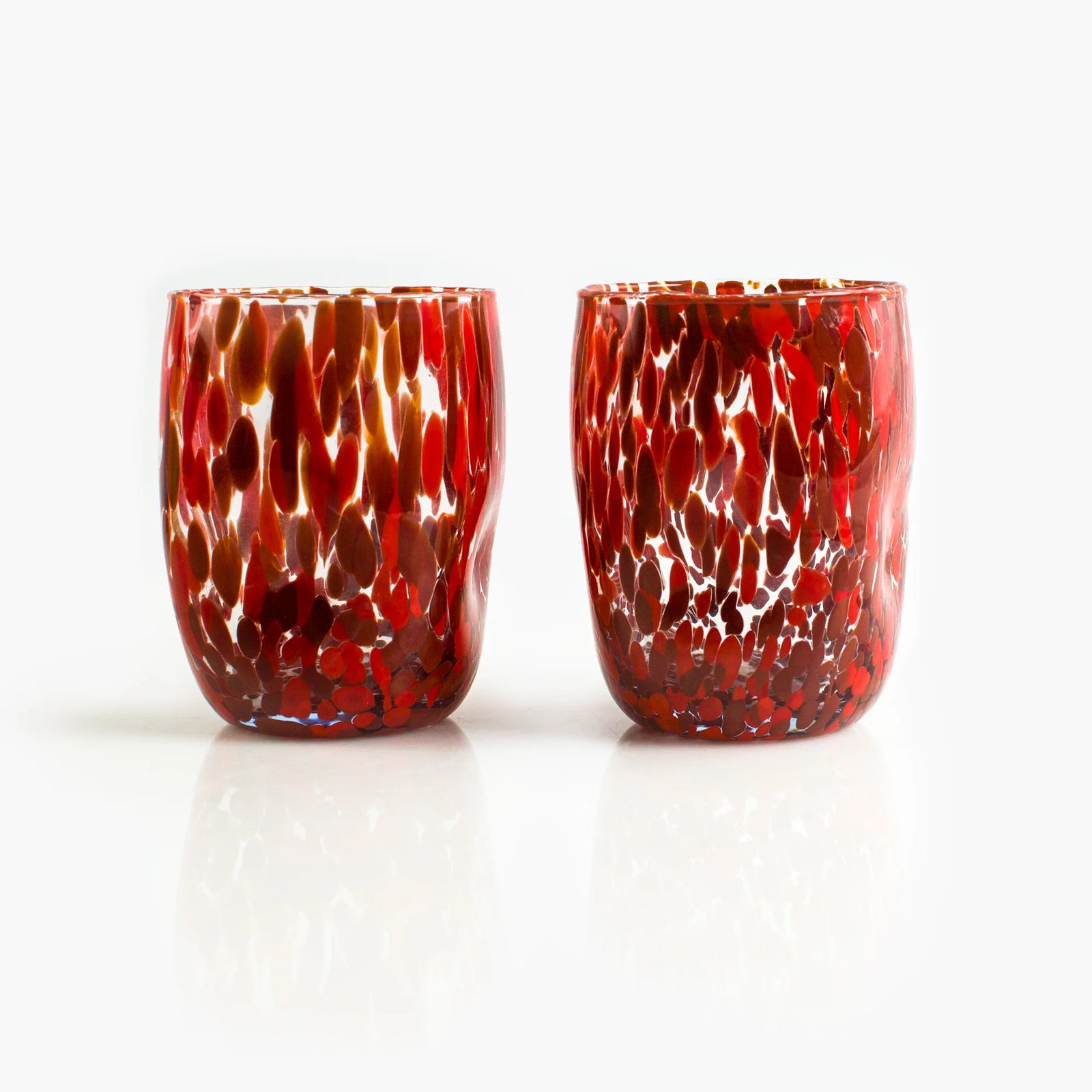 Set of two Viva Murano glass tumblers with vibrant colors and intricate patterns, crafted in Italy by My Italian Decor.