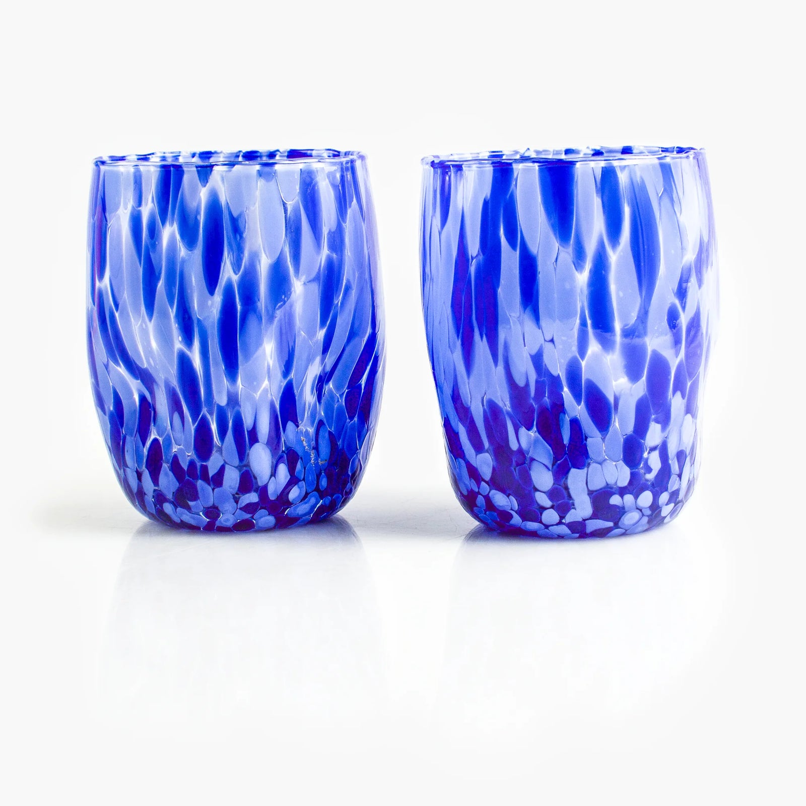 Set of two Viva Murano glass tumblers with vibrant colors and intricate patterns, crafted in Italy by My Italian Decor.