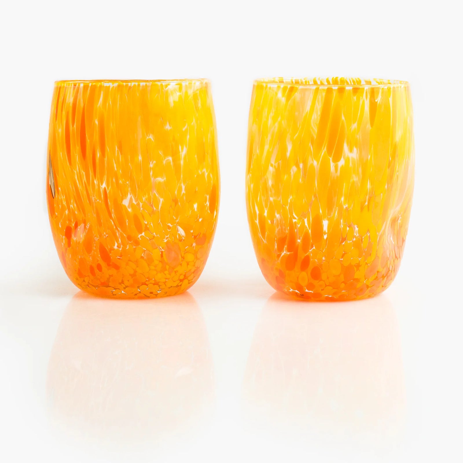 Set of two Viva Murano glass tumblers with vibrant colors and intricate patterns, crafted in Italy by My Italian Decor.