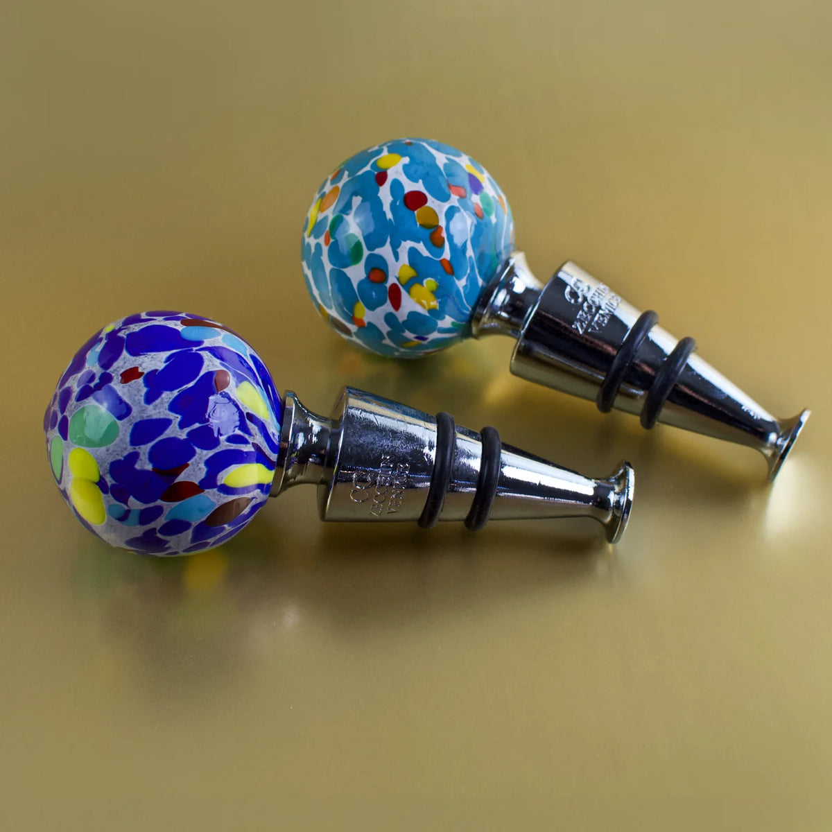Colorful Murano glass wine stopper featuring festive multicolor design, perfect for sealing wine bottles and adding decorative flair.