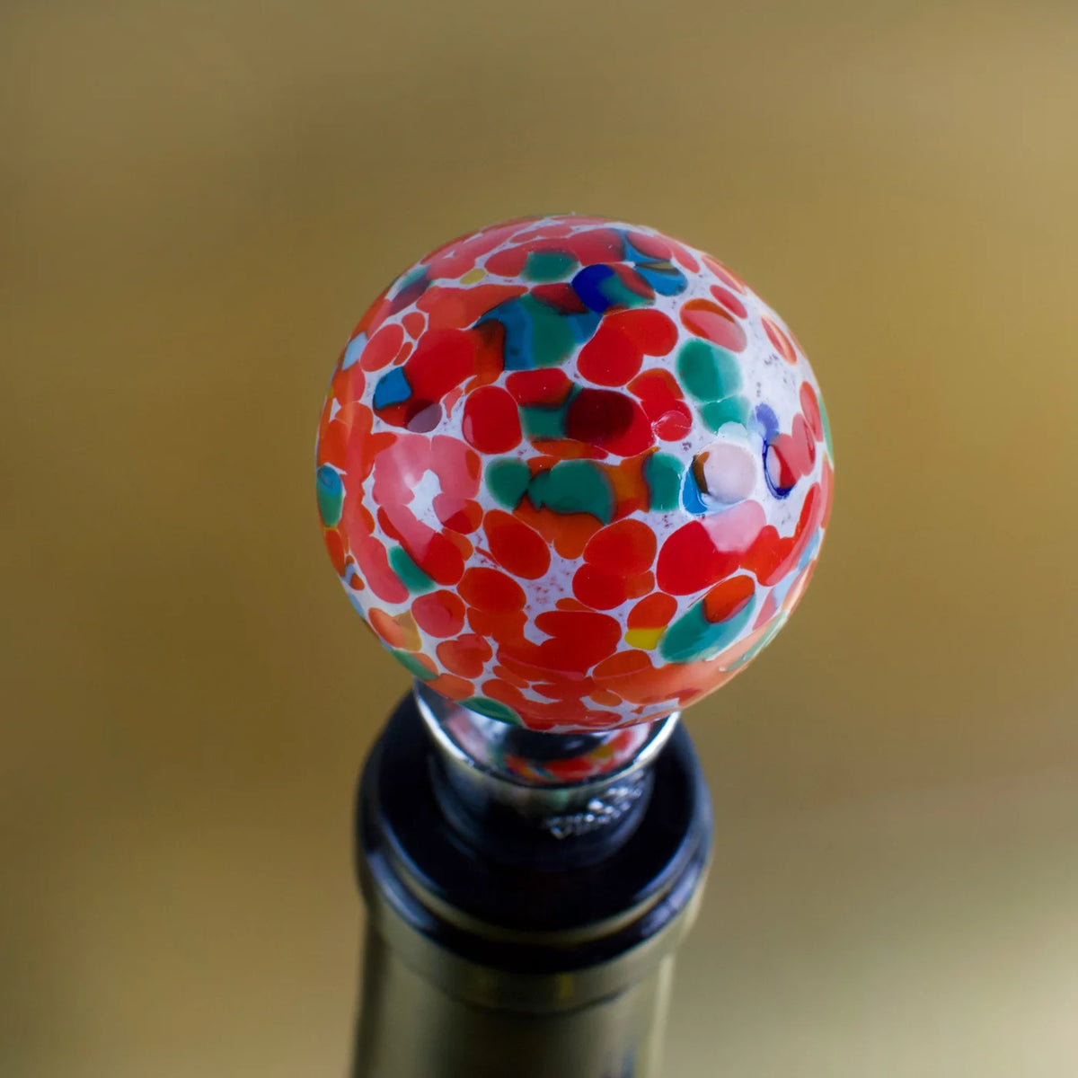 Colorful Murano glass wine stopper featuring Festa multicolor design, perfect for sealing wine bottles with elegant Italian craftsmanship.