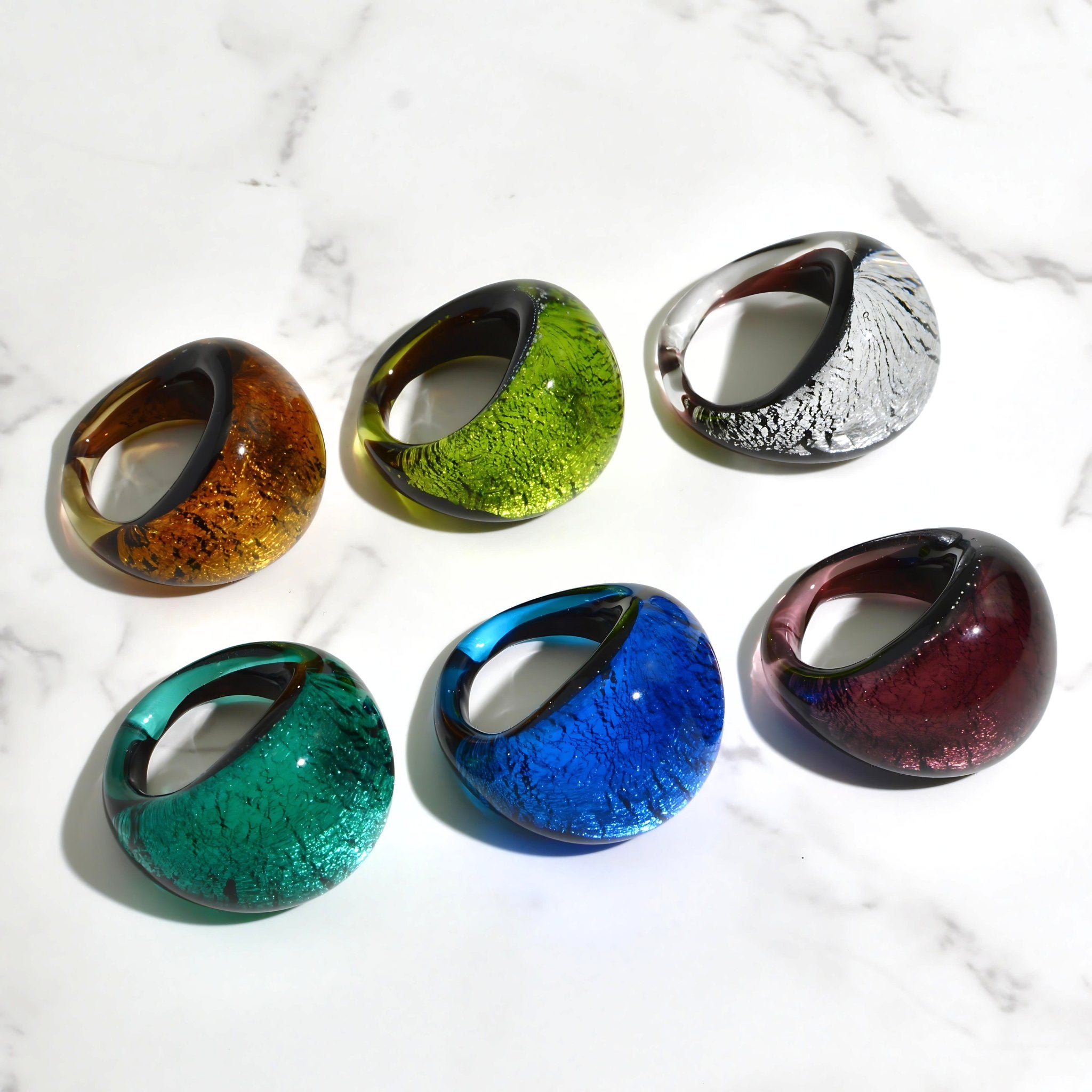Murano Glass Arno Statement Ring in cobalt, teal, and silver, handcrafted in Italy, featuring vibrant, colorful glass art.