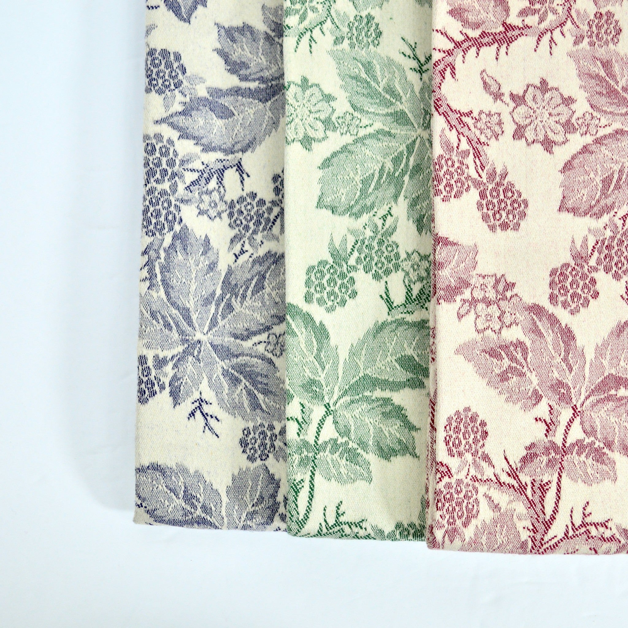 Busatti Berry Kitchen Towel in assorted colors, made in Italy, featuring woven fabric and vibrant berry pattern.