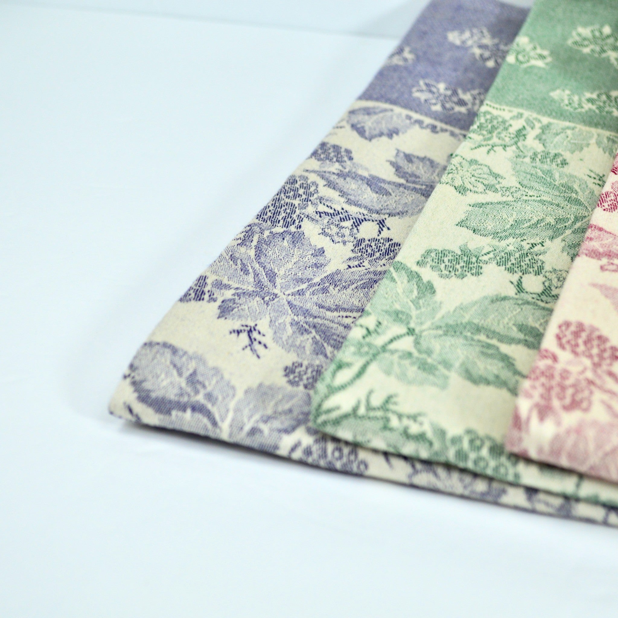 Assorted colors Busatti Berry Kitchen Towel made in Italy, featuring traditional woven fabric and vibrant berry pattern for kitchen decor.
