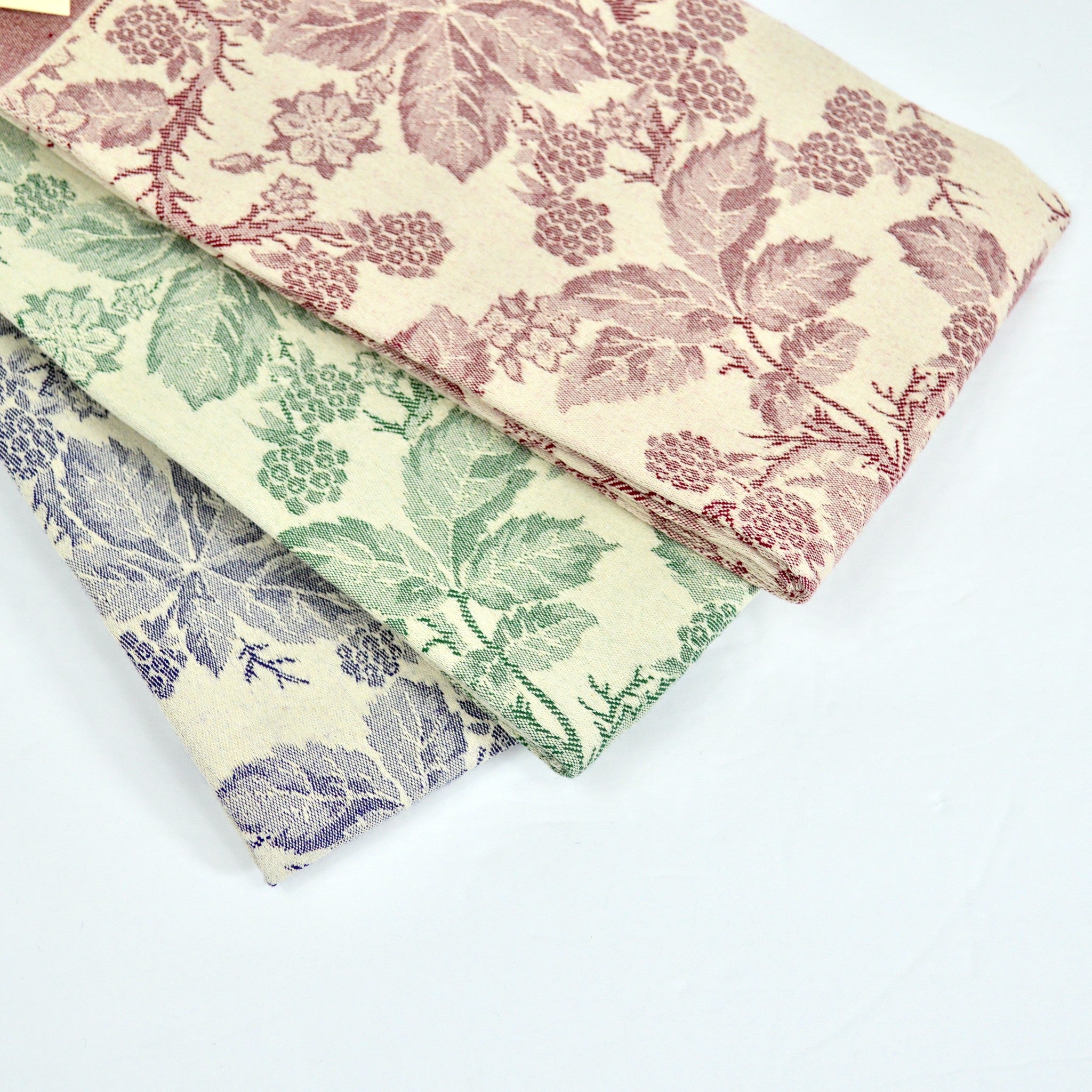 Assorted colorful Busatti Berry Kitchen Towels made in Italy, soft cotton towels with berry pattern for kitchen use.