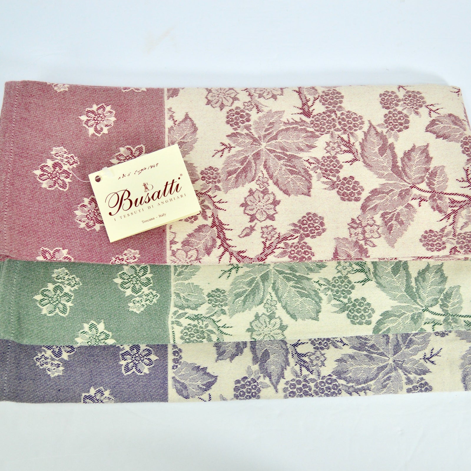 Busatti Berry kitchen towel set in assorted colors, made in Italy, featuring vibrant, woven cotton fabric for stylish kitchen decor.