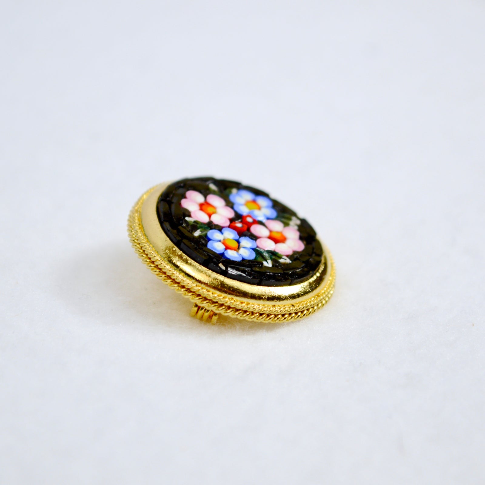Colorful Florentine mosaic round brooch by My Italian Decor, featuring intricate Italian craftsmanship and vibrant mosaic design.