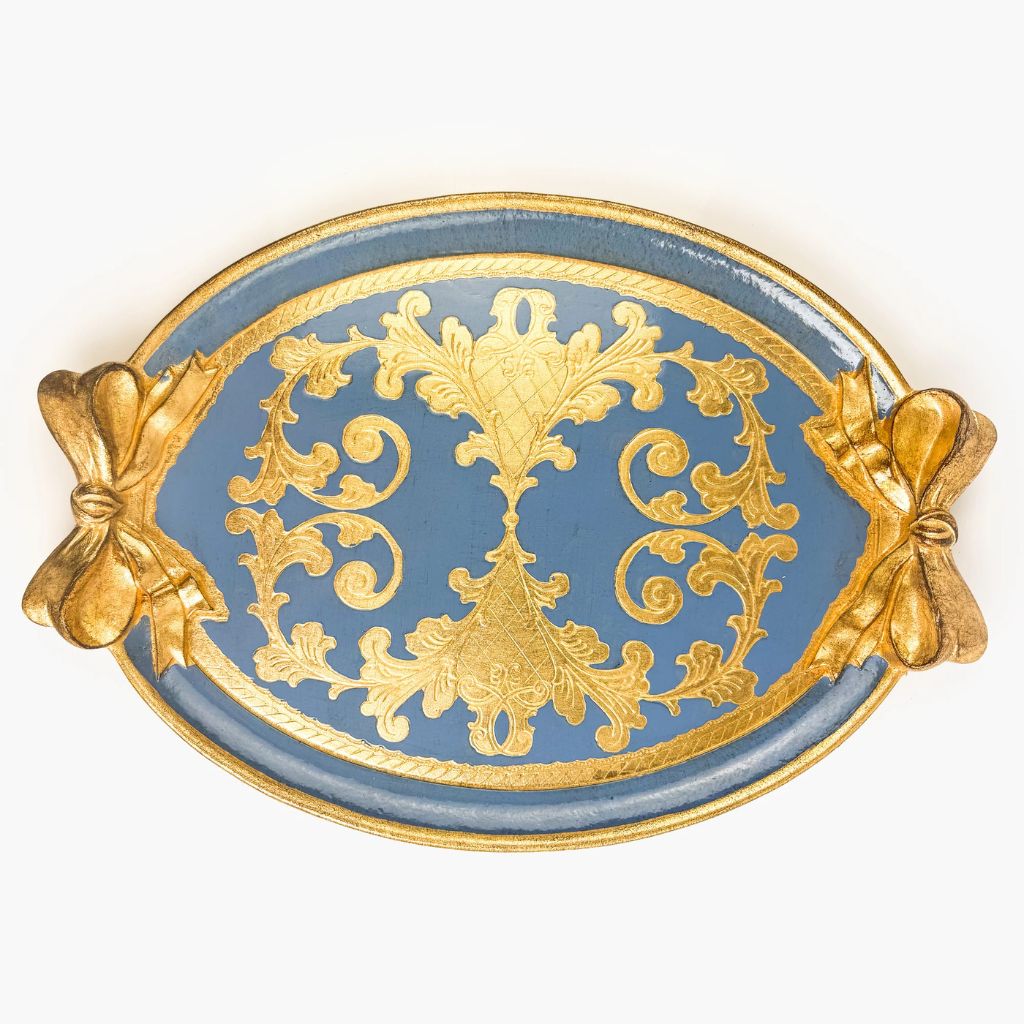 A carved oval, dusty blue and gold Florentine tray with a bow detail.