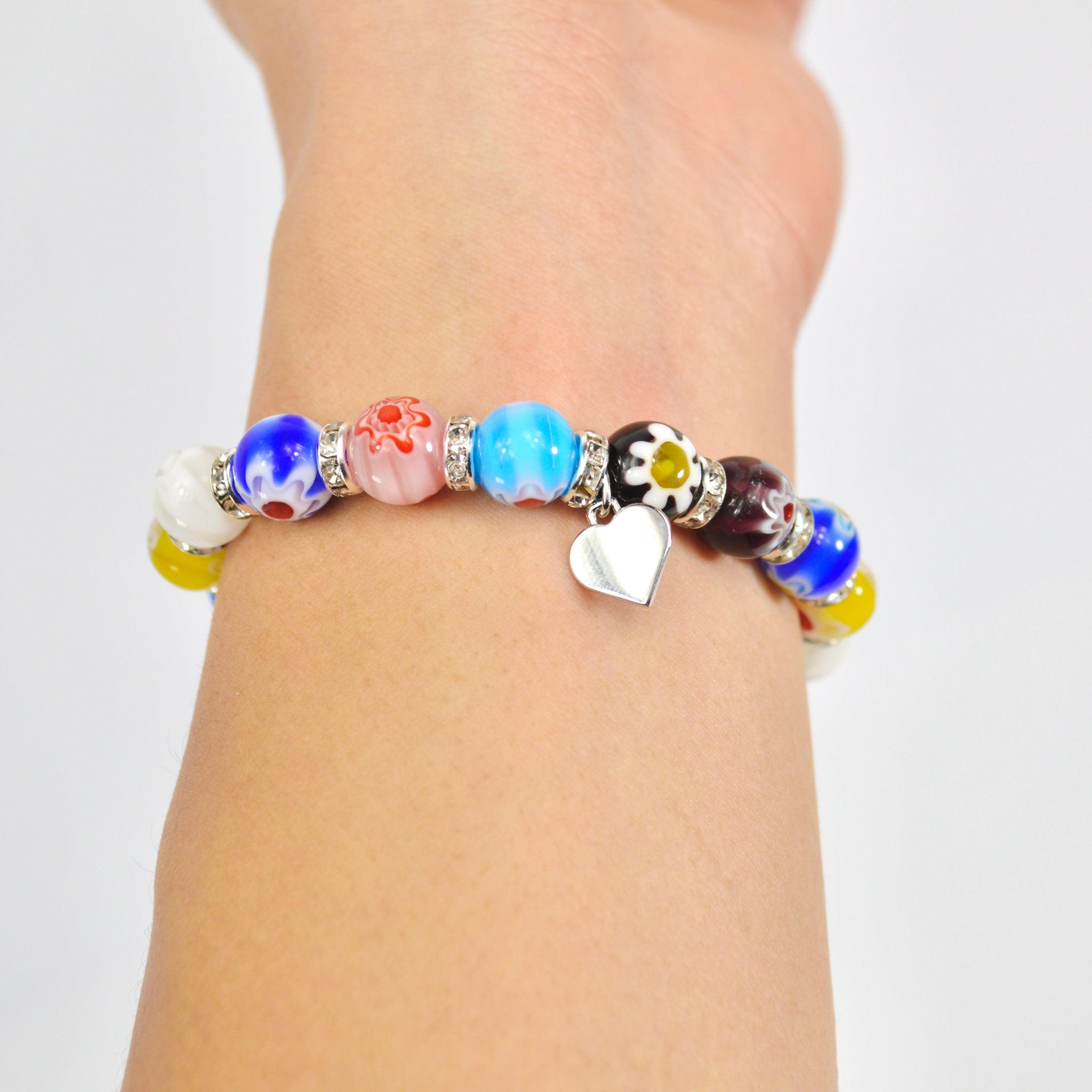 Murano glass Millefiori bead elastic bracelet on arm, handmade Italian jewelry by MyItalianDecor.