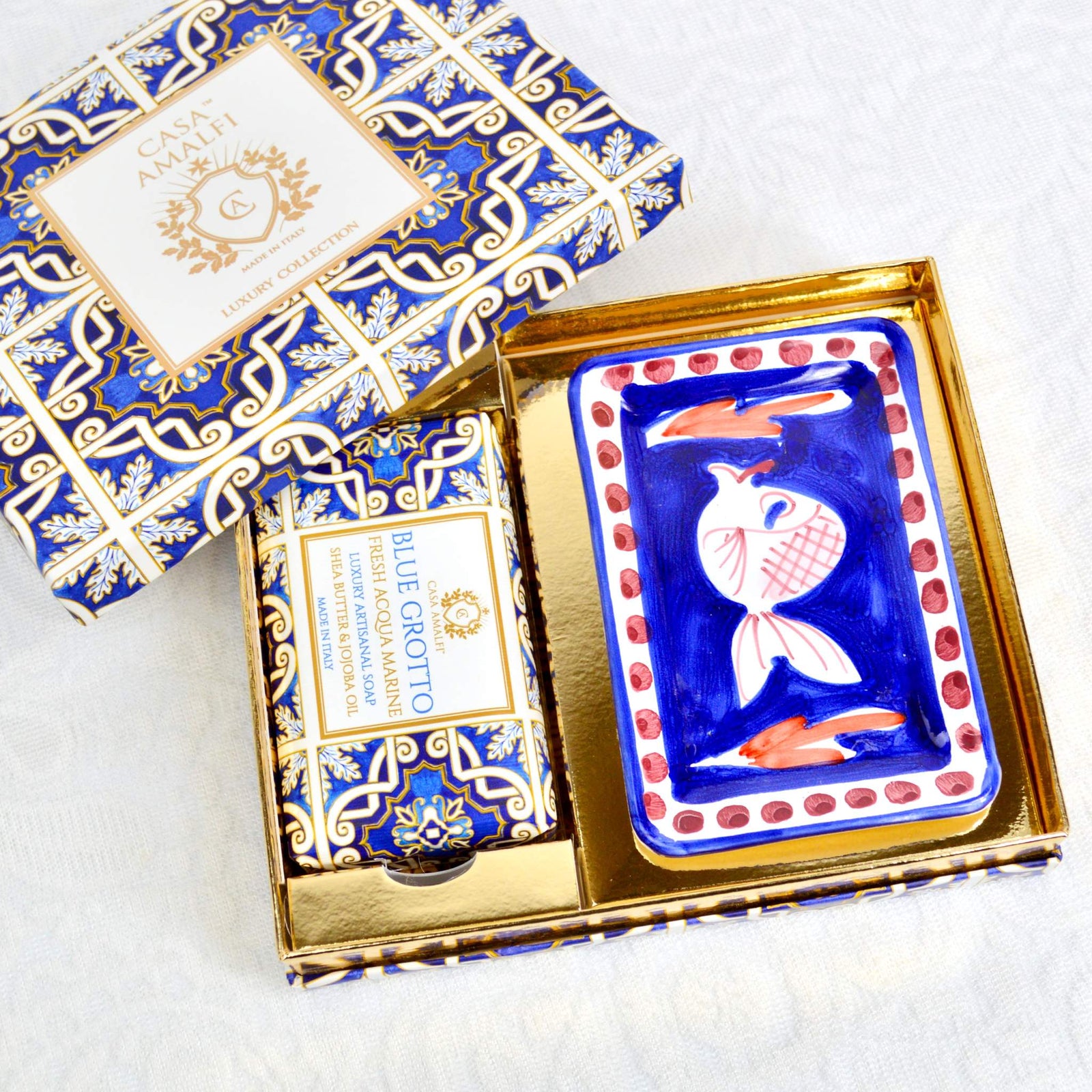 Cobalt blue ceramic dish set with fish motif for soap and bar soap from My Italian Decor, made in Italy.