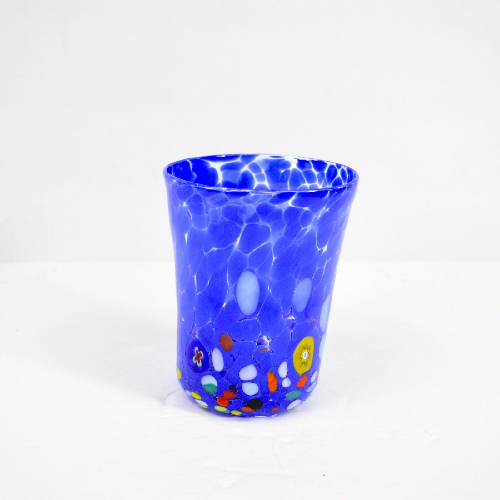 Medici Murano Glass Tumbler by MyItalianDecor featuring colorful Millefiori design, hand-blown drinking glass for elegant beverage service.