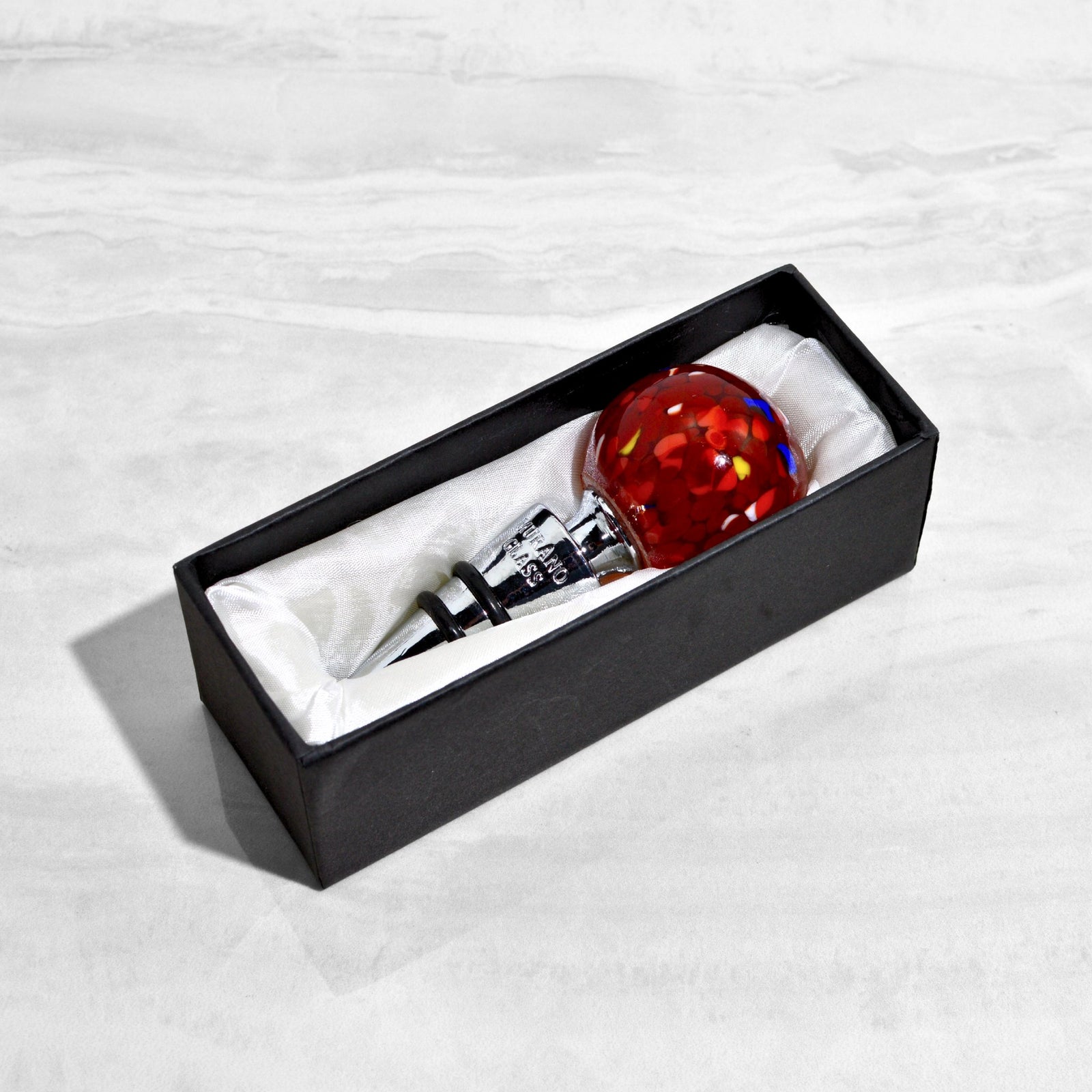 Murano glass confetti wine stoppers from MyItalianDecor, colorful and decorative bottle stoppers for preserving wine.