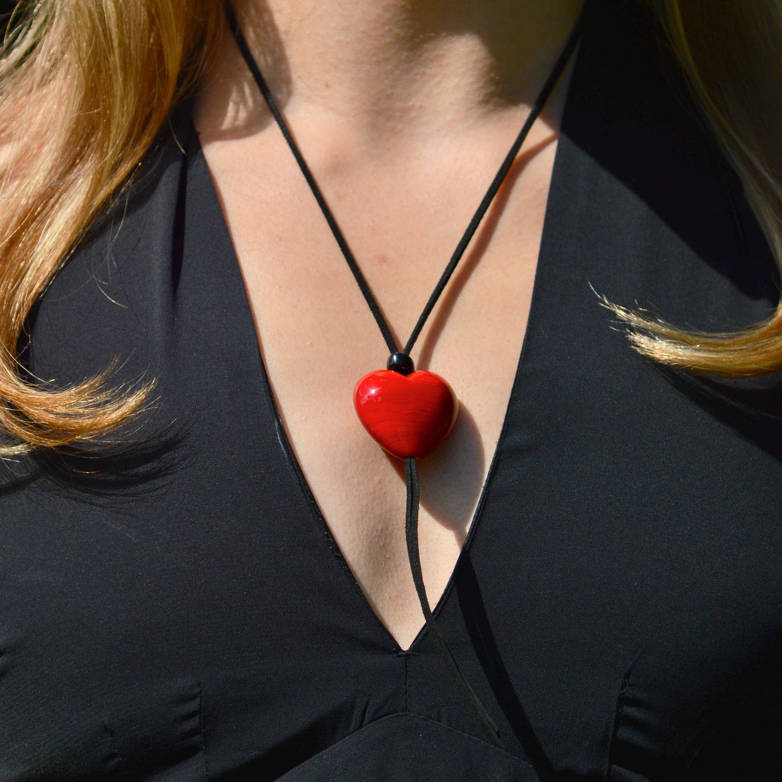 Colorful Murano glass Amore Heart pendant necklace with Italian craftsmanship, featuring a vibrant glass heart charm on a delicate chain.