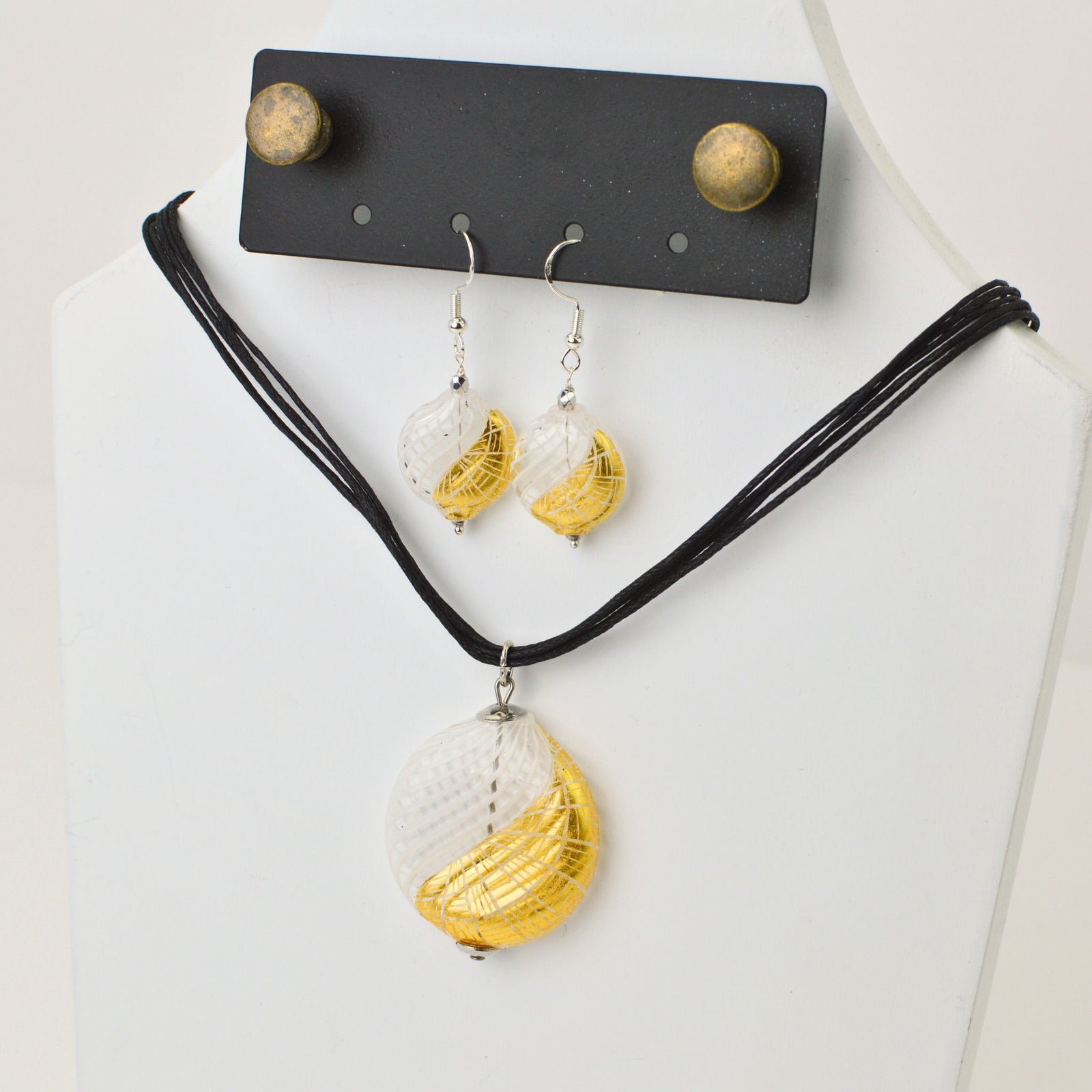Handcrafted Murano Glass jewelry set with clear and gold accents, featuring necklace and earrings from My Italian Decor.
