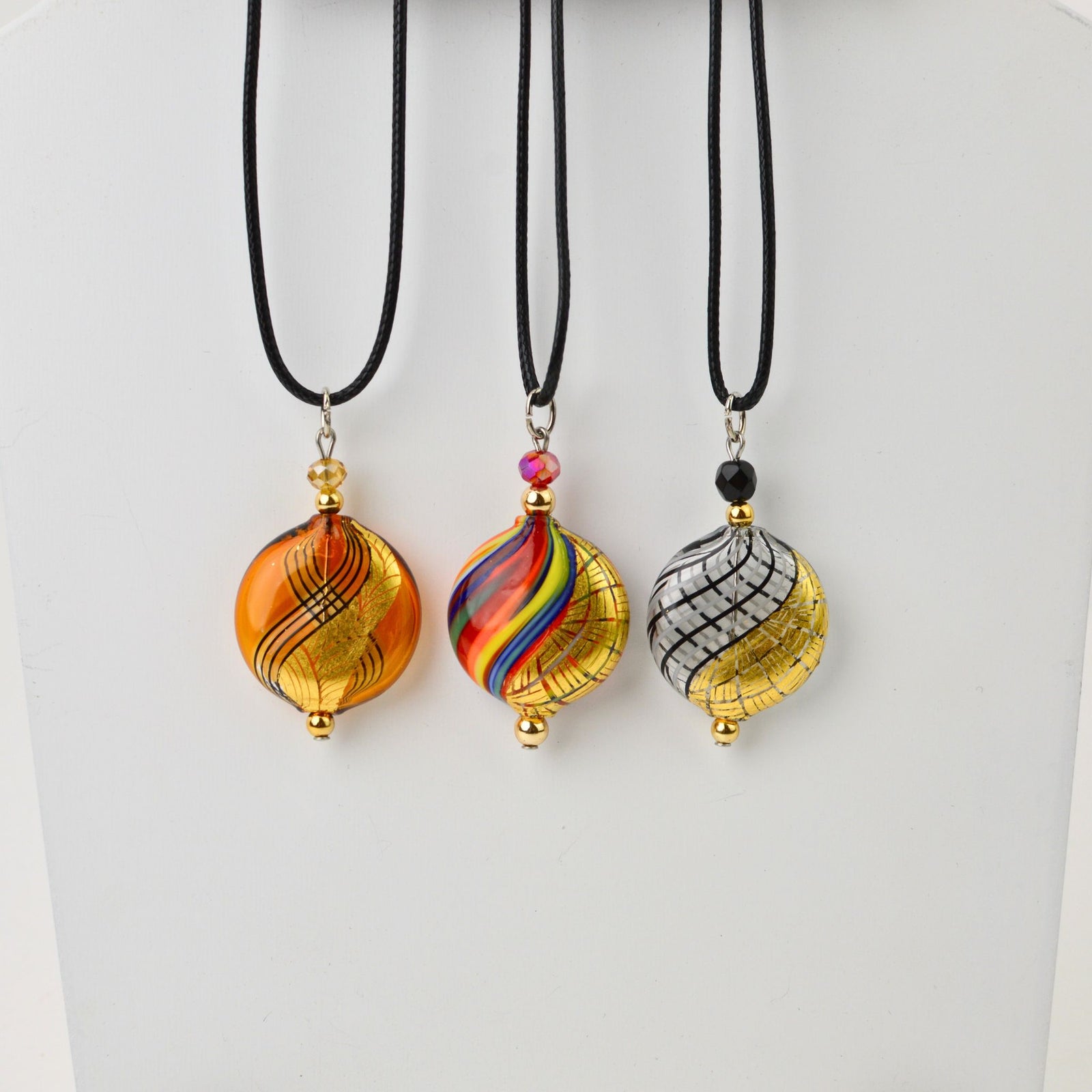 Small Murano Glass Aria Necklace in amber, multi-colored or black, handcrafted jewelry set with etched gold details from Italy.